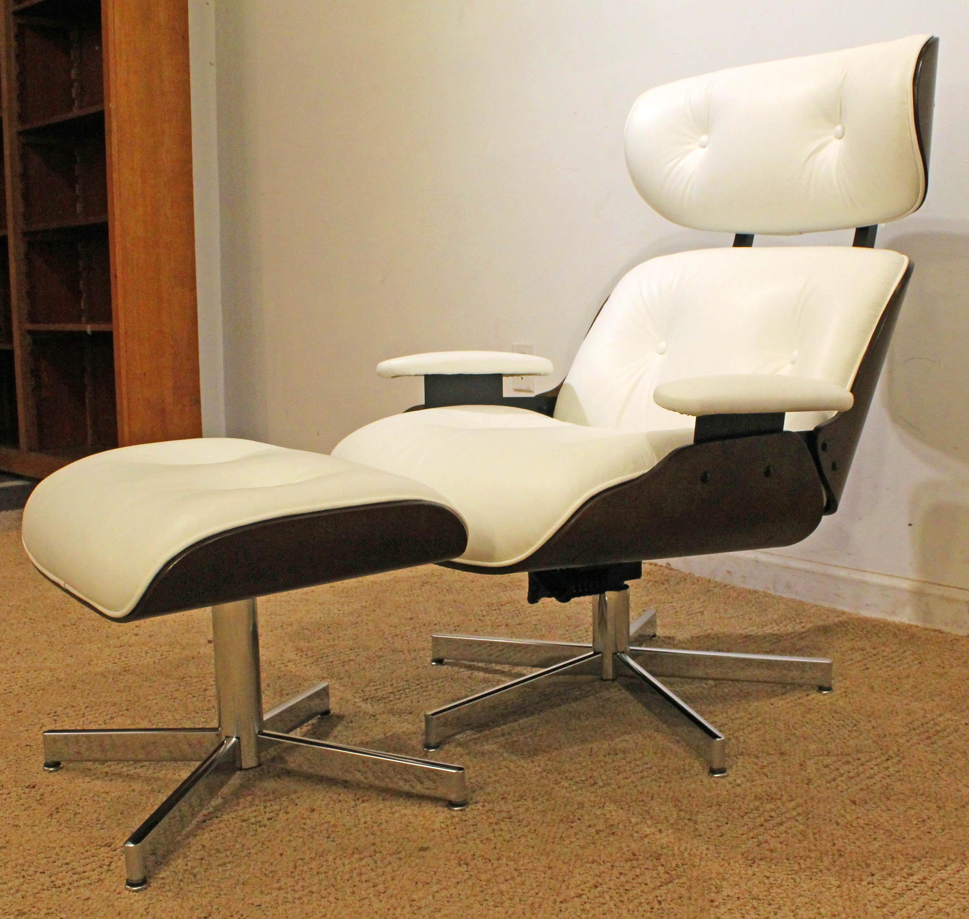 What a find. Offered is a midcentury Danish modern Selig Eames leather swivel lounge chair/ottoman. This chair is an original, signed Selig and has been completely restored with new white Redondo leather. It is in excellent condition, like