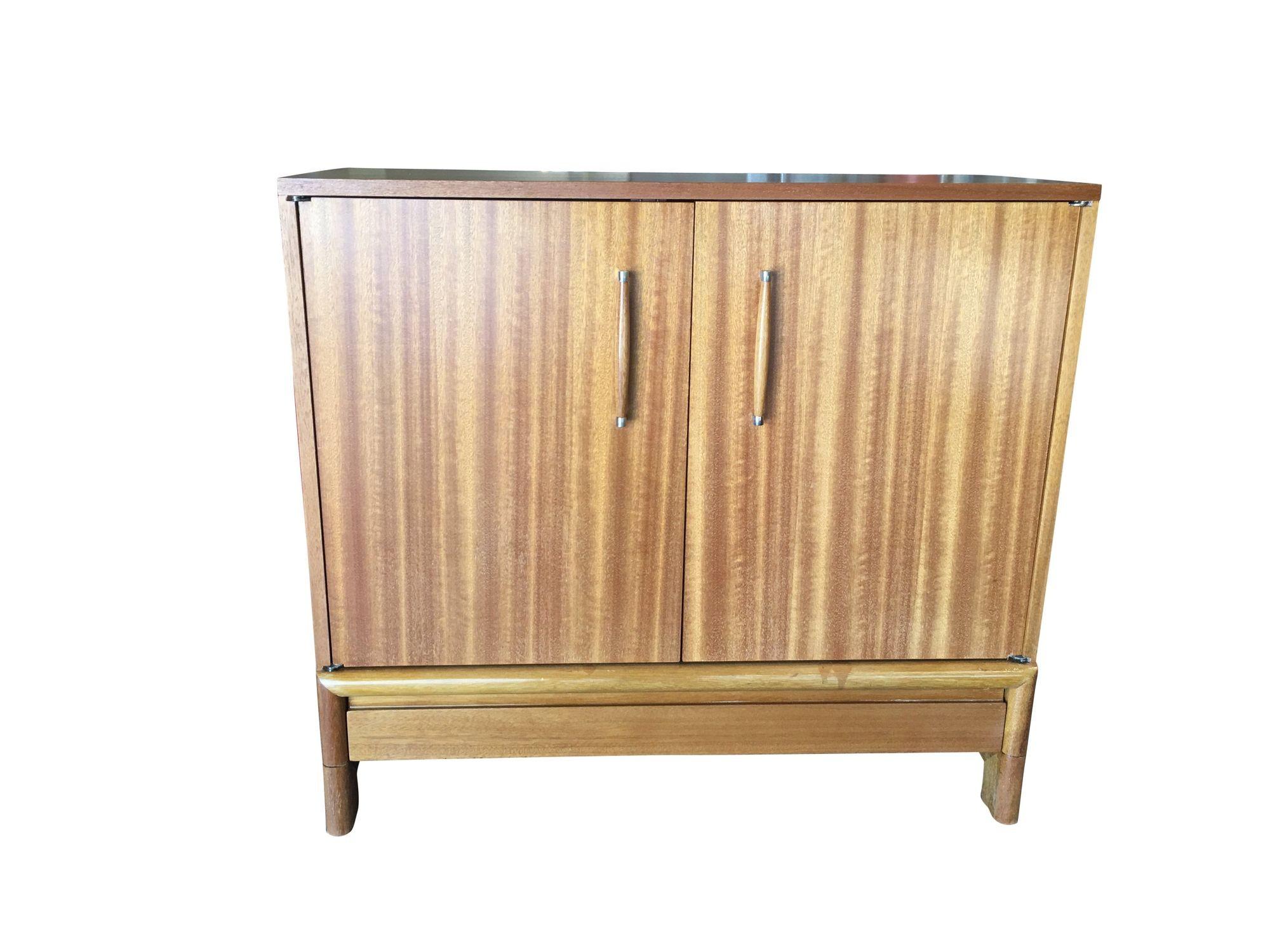 Embracing the essence of mid-century Danish modern design, this oak sideboard cabinet epitomizes sleek simplicity. Clean lines, organic materials, and a warm oak finish define its timeless allure, offering functional elegance for any space seeking a