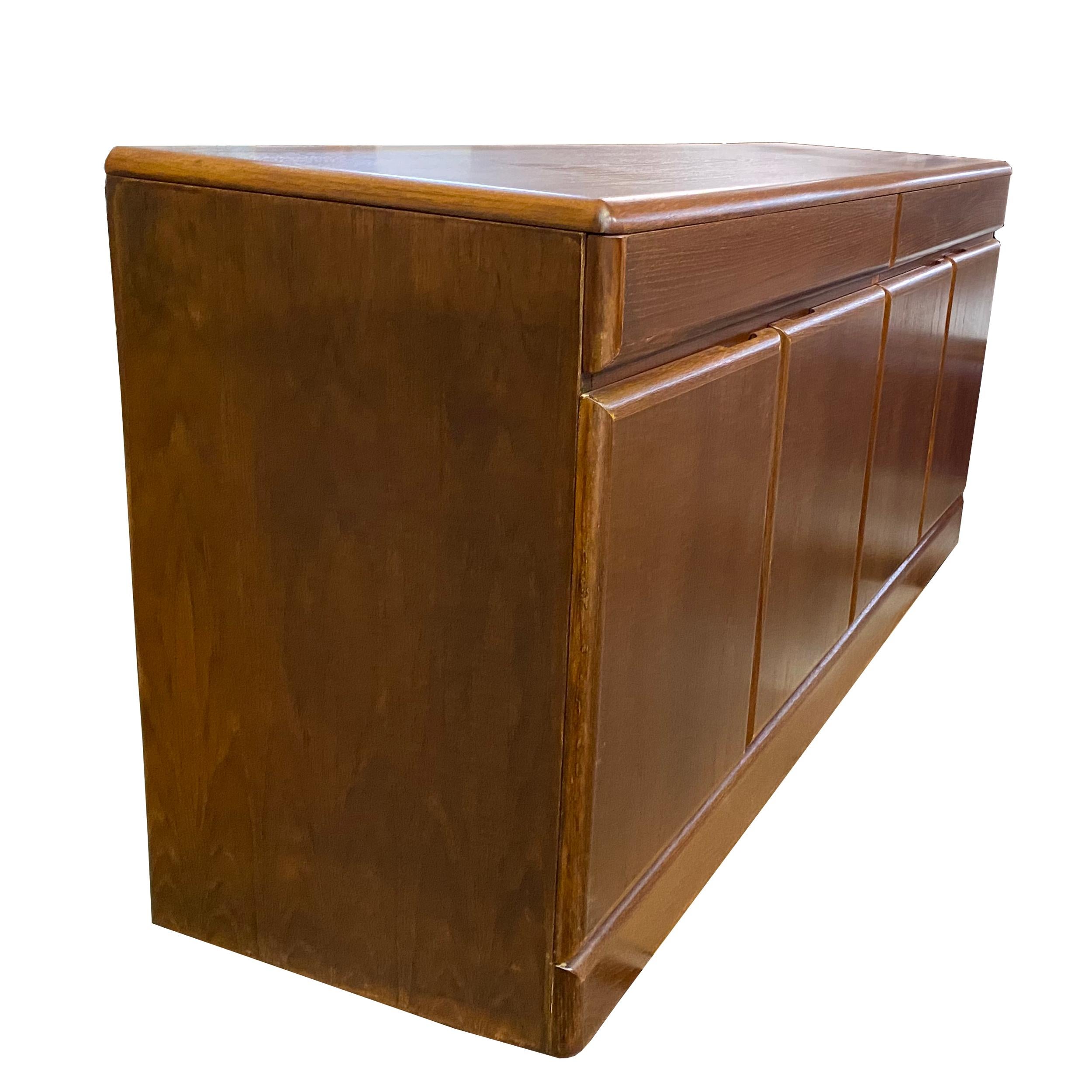 Vintage mid century teak Credenza
Ample storage for dining and silverware with 2 top drawers and storage below.