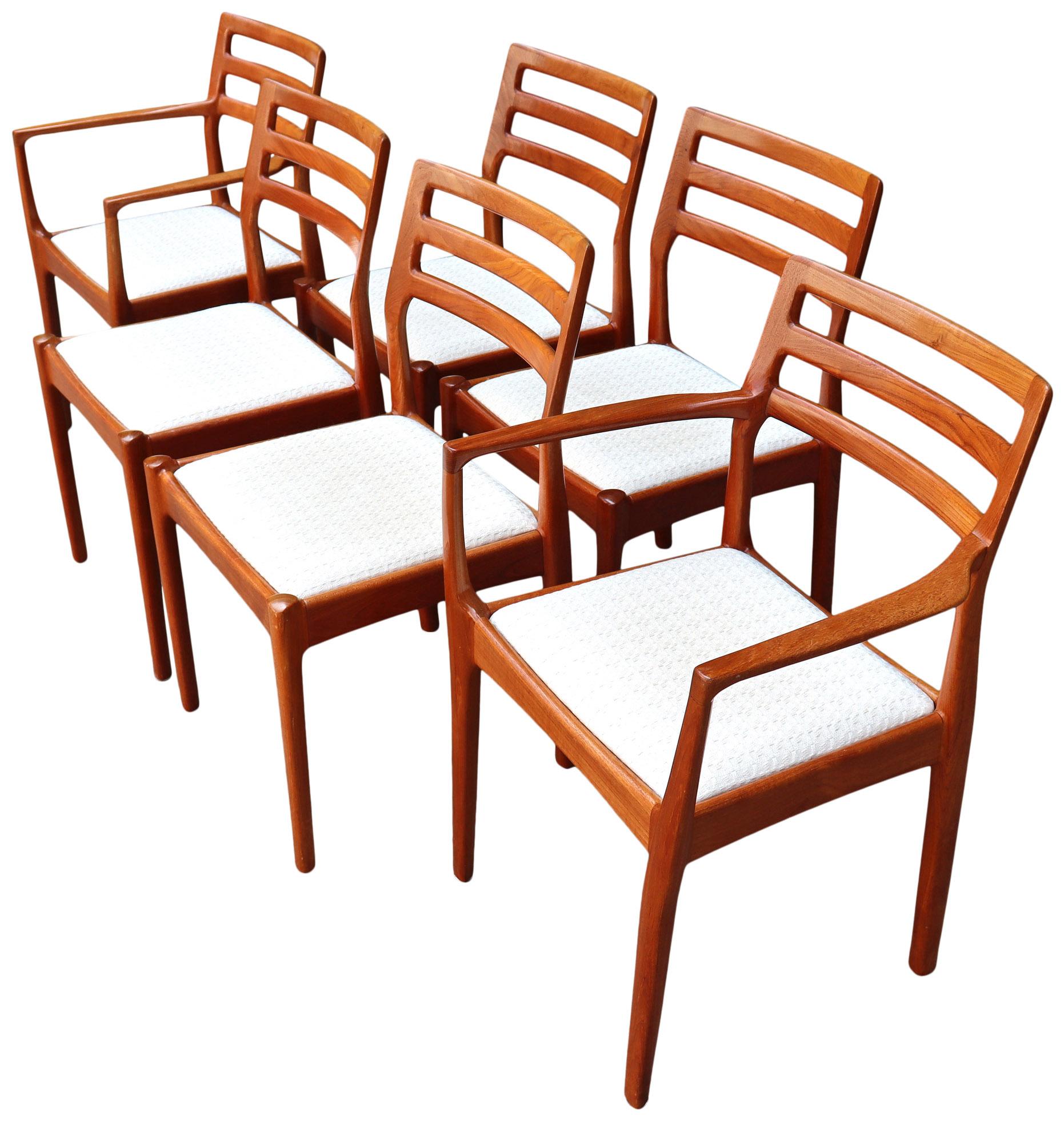 Beautiful and sturdy Scandinavian ladder back dining chairs in teak with graceful curved lines. In wonderful condition showing very little wear and ready for use. Uphostery is in good condition and also very easy to recover the seats and they are