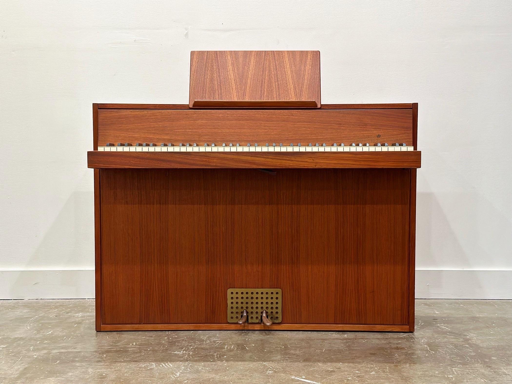 Vintage Danish modern teak spinet upright Pianette by Andreas Christensen for Hindsberg Dansk, circa 1970s. 
Serial #13793
Excellent overall condition with minor cosmetic signs of use.
We just had her tuned and she sounds great! We can send videos