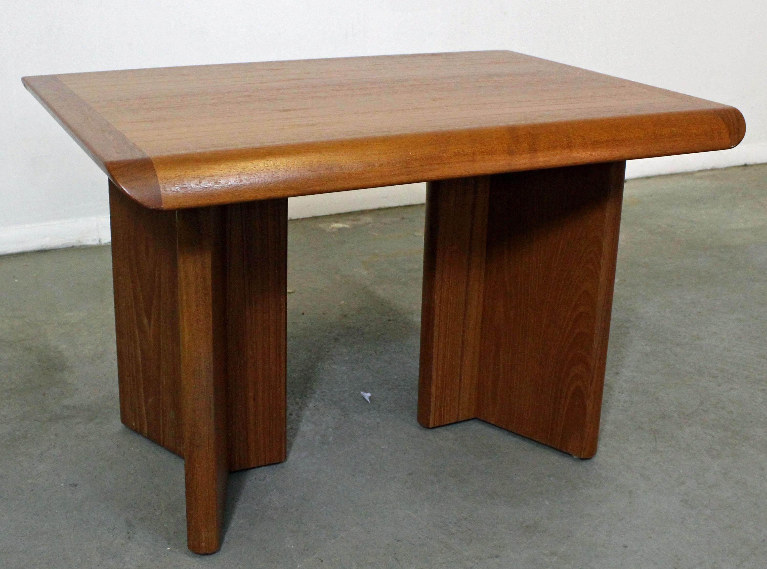 What a find. Offered is a teak end/side table with a sculpted base. It is in very good condition, showing minimal age wear. A great set to piece to your home. It is not marked.

Approximate dimensions:
30.75