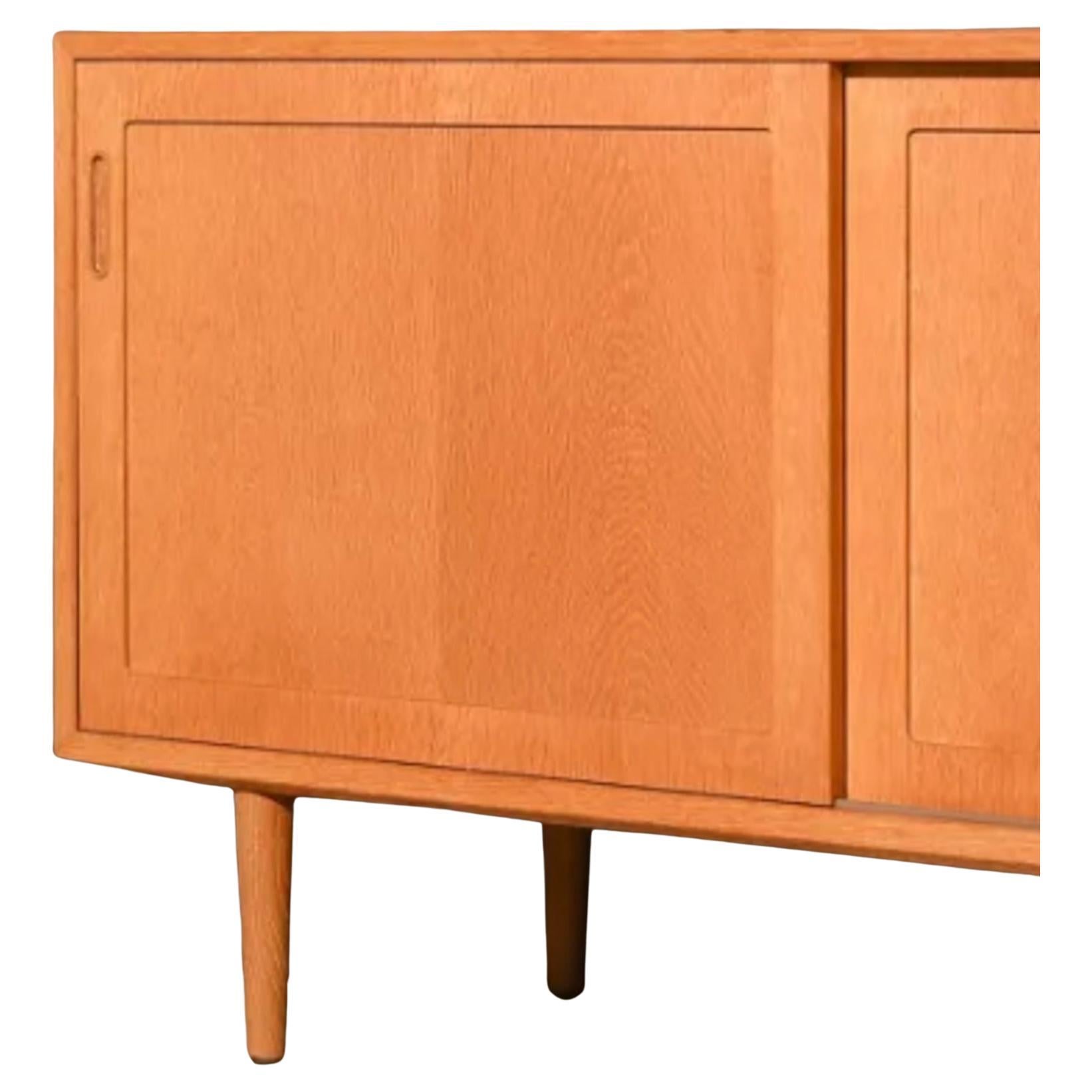 Midcentury Danish Modern Teak Sliding Door Credenza Sideboard on Tapered Legs In Good Condition For Sale In BROOKLYN, NY