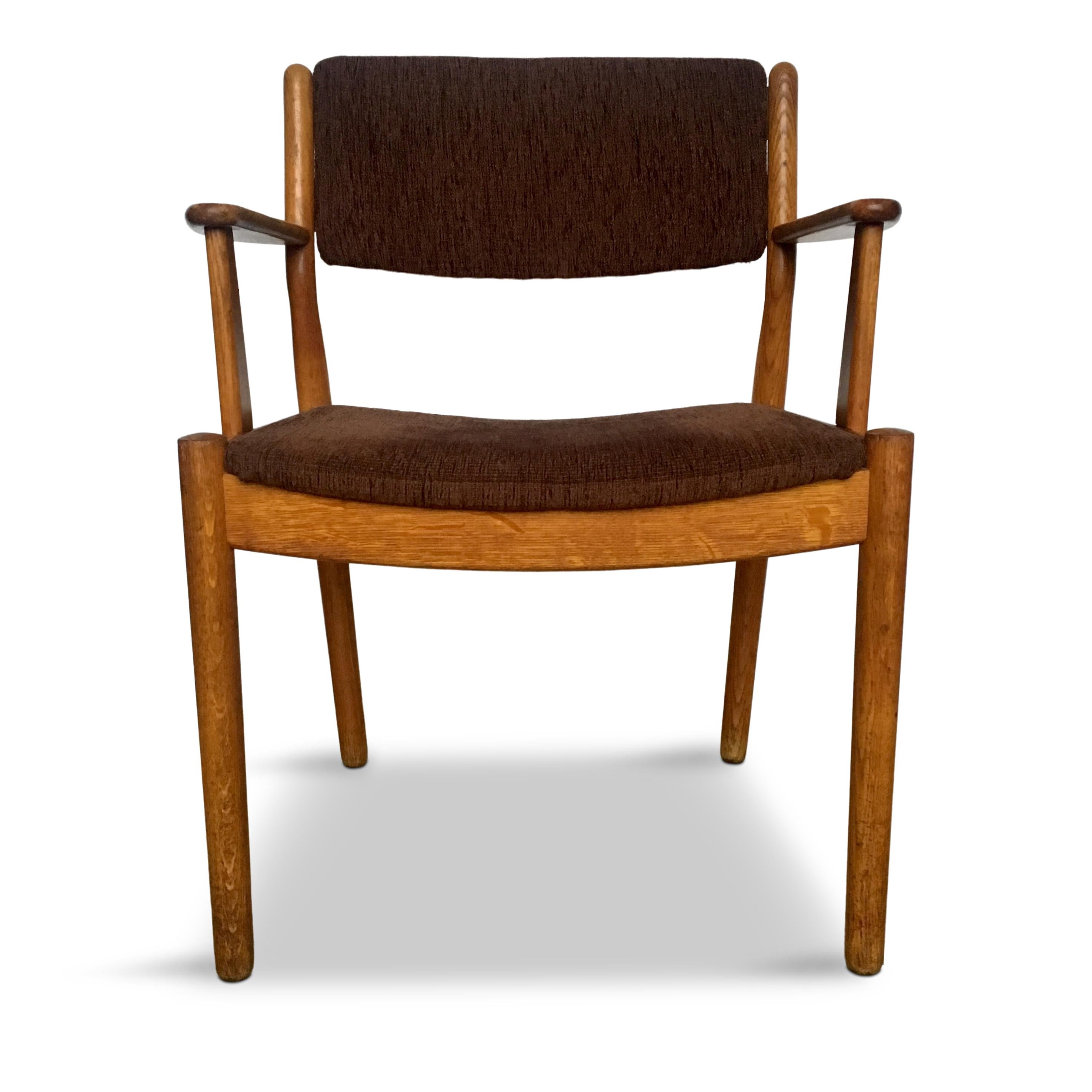 Danish design, oak and fabric armchair. 

Original vintage condition, cleaned and oil-restored

This model was designed in 1954 by Poul Volther for FDB and was published in their 1955 catalogue (the photos are from the catalogue)

Measures: H