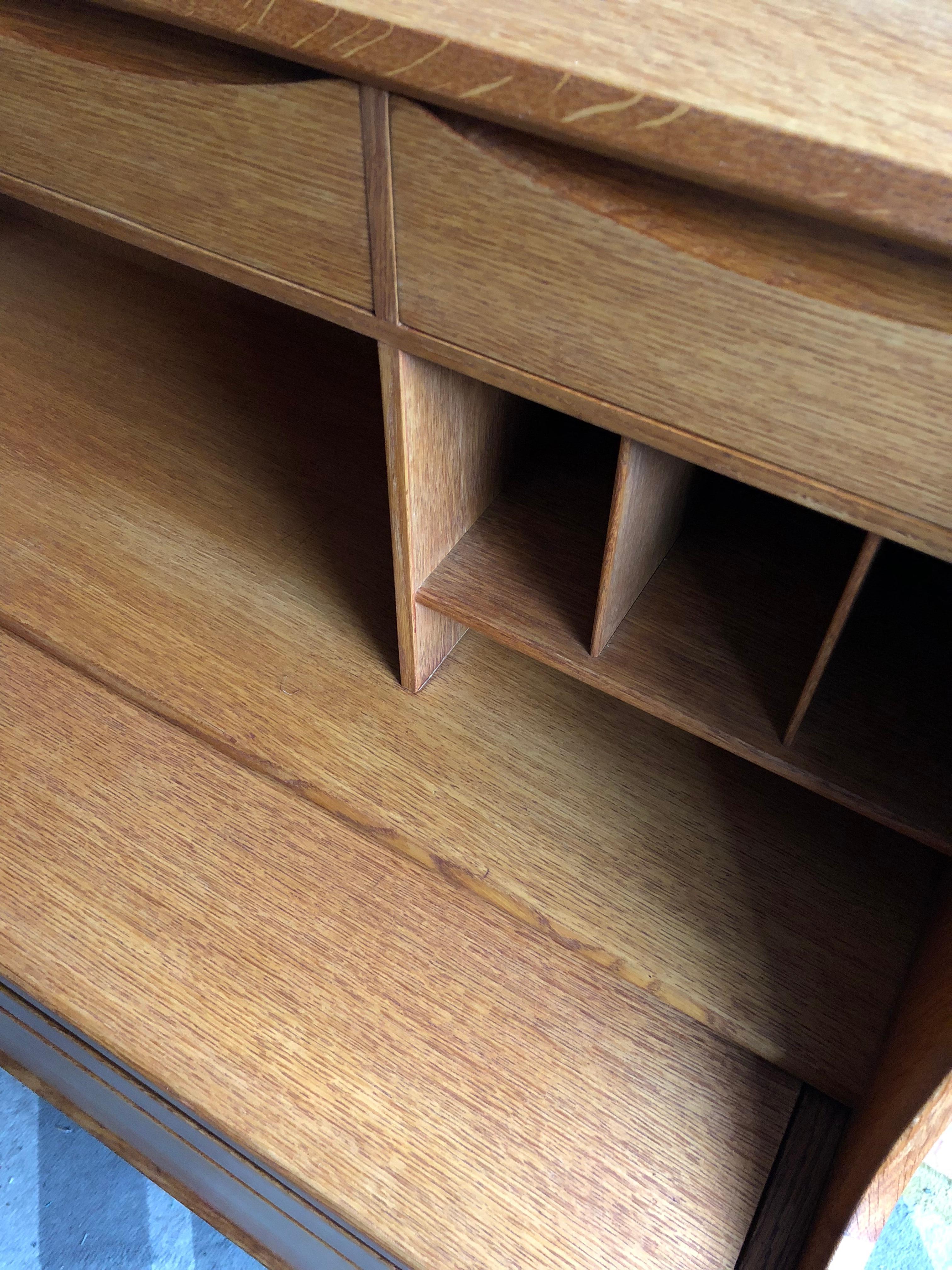 A well designed and crafted Secretaire Bureau from Orum Møbler, Denmark, circa 1960. This can also be used as a vanity unit with its interior mirror and compartments. Constructed from European white oak. In fantastic condition. Surface has been