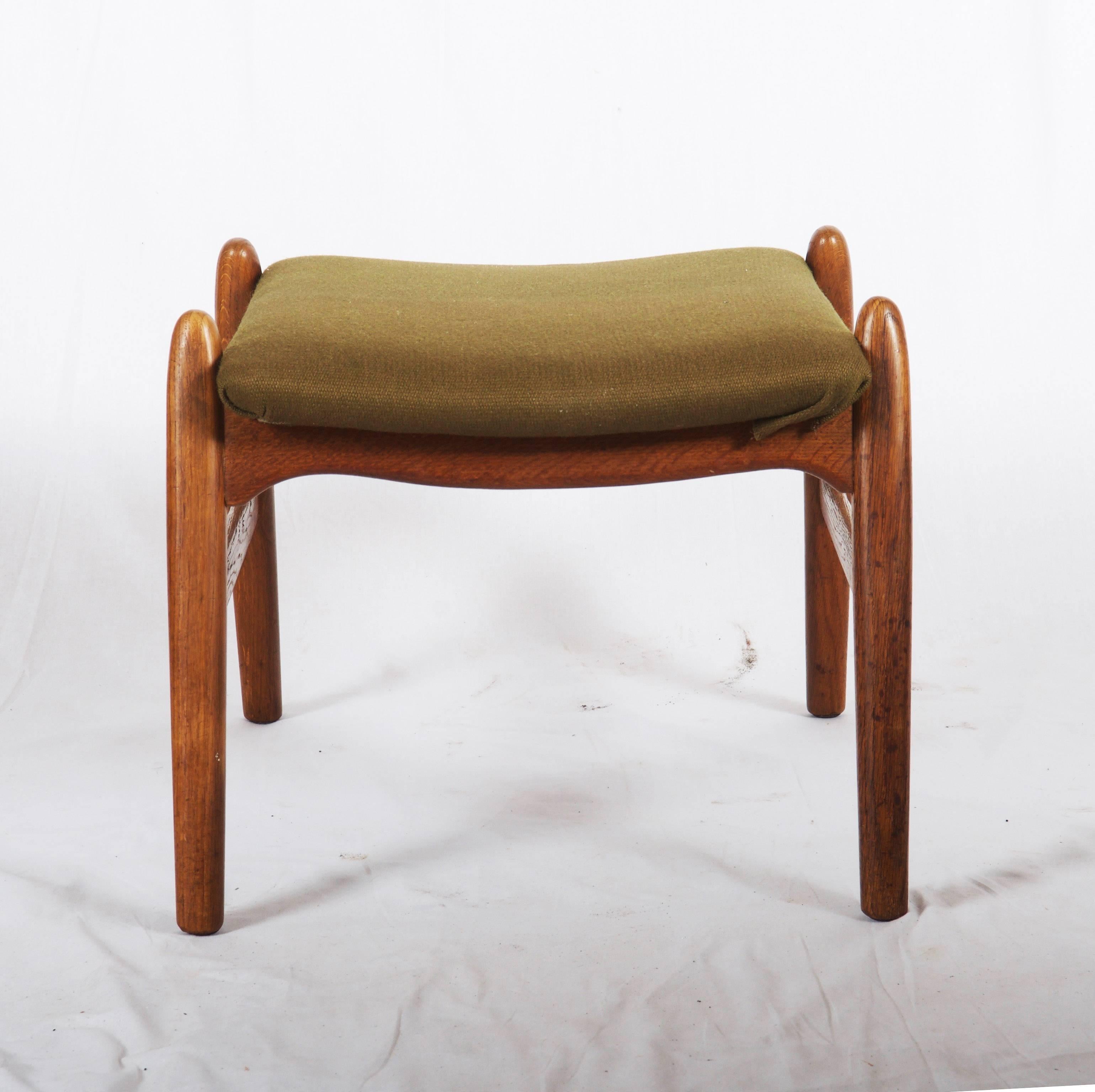 Teak stool upholstered. Made by an unknown furniture maker in Denmark in the 1960s.
New upholstery on request free of charge possible (just cost of the new fabric).
 