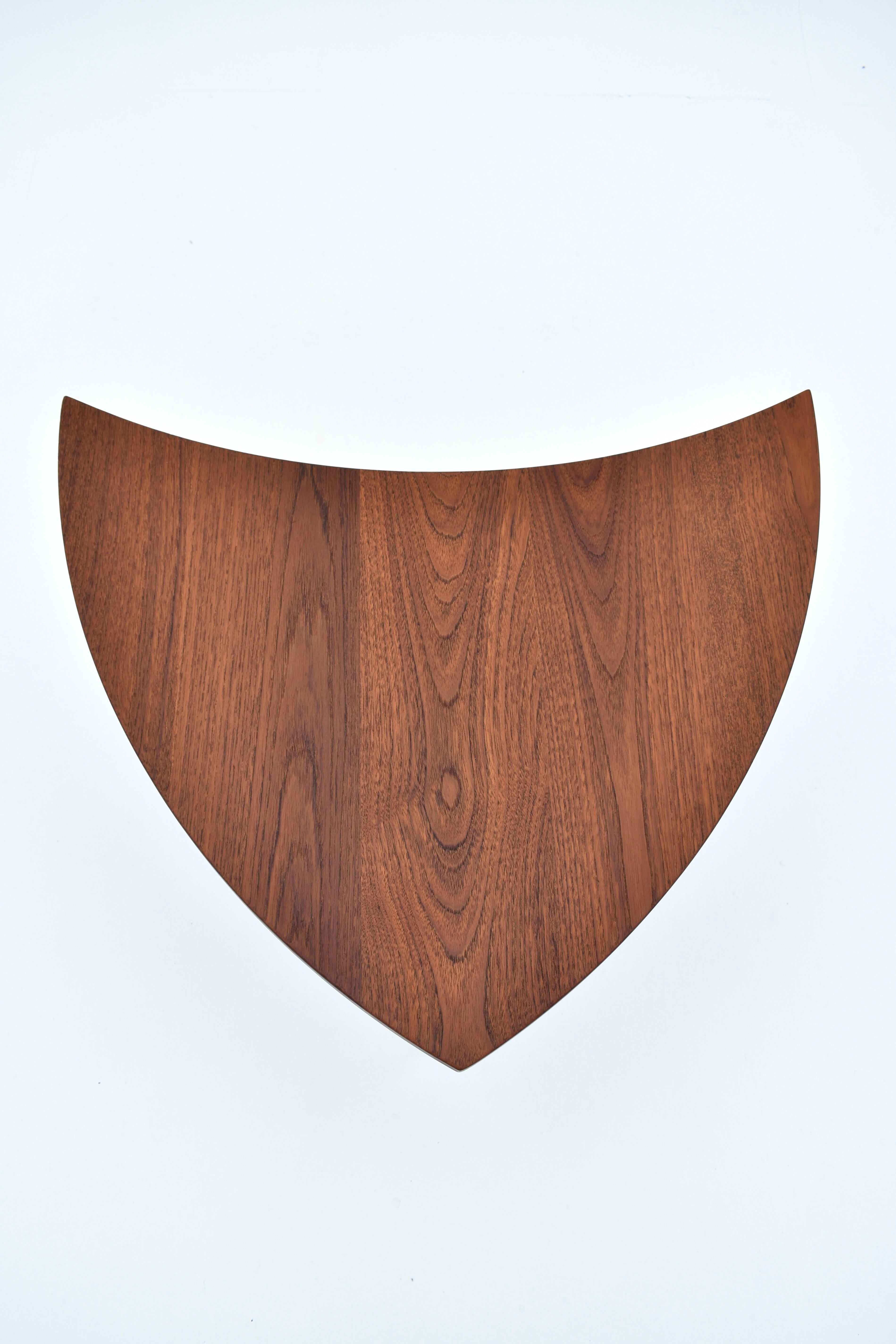 A very hard to find Pinwheel table designed in the mid 50’s by Hvidt & Molgaard.

This listing is for a single table however at the time of writing we have a second example available to make a pair. Produced from solid Teak with brass plated