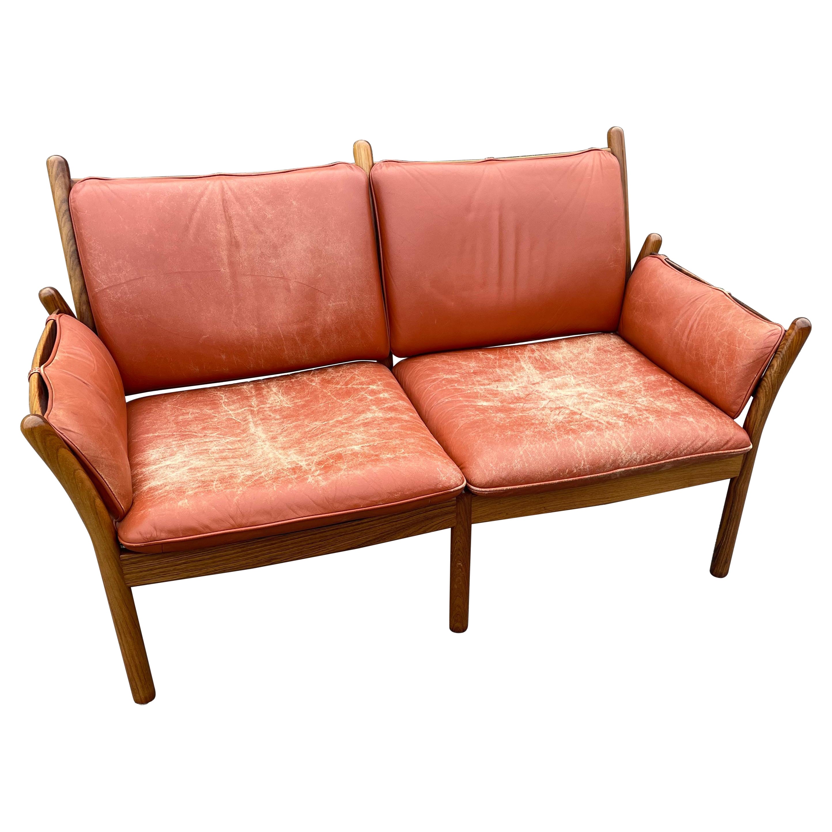 Canapé danois du milieu du siècle en bois de rose et cuir par Illum Wikkels pour CFC Silkeborg