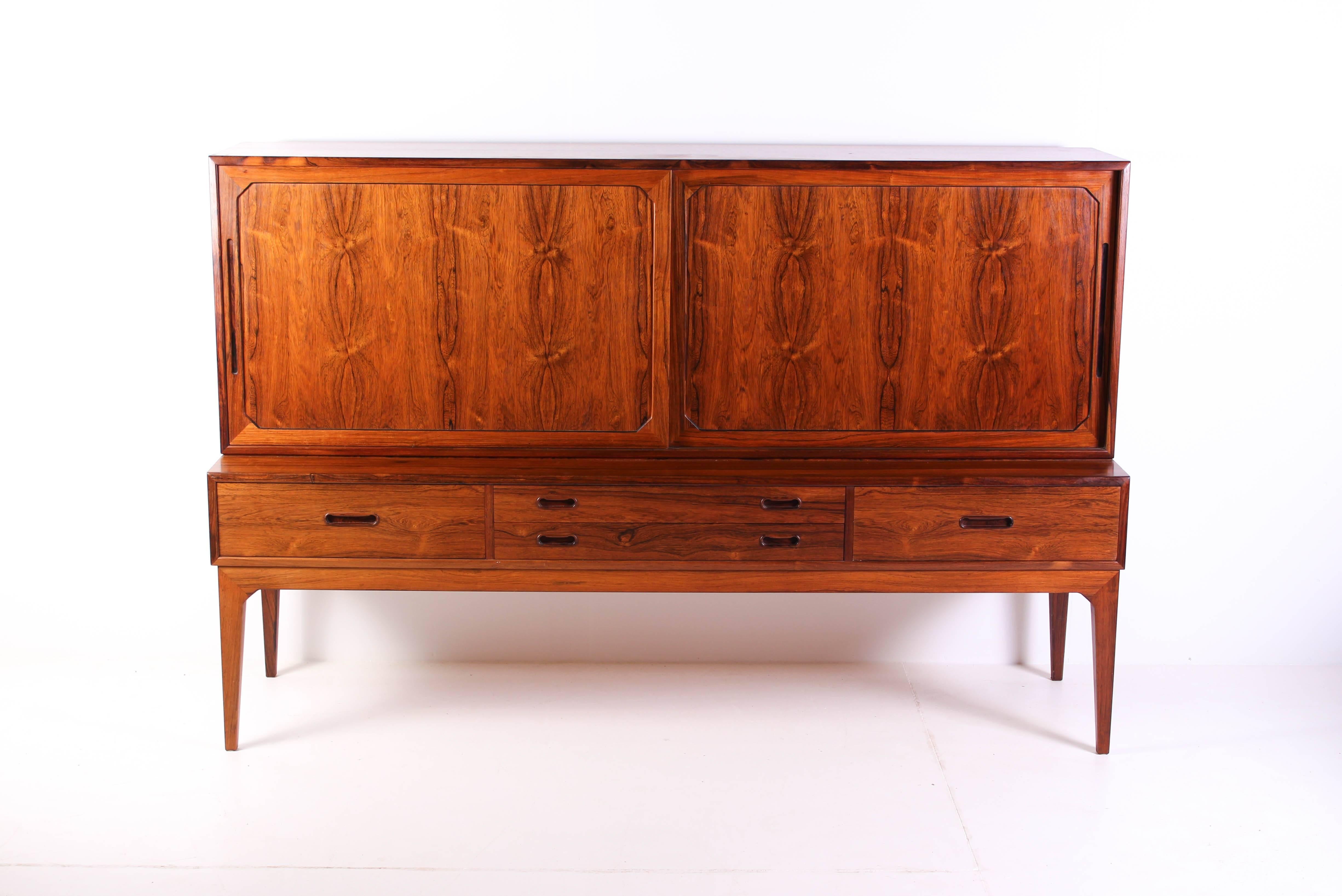 This rare sideboard by Danish manufacturer Severin Hansen is made out of rosewood and is in excellent vintage condition. This piece features several nice details and is made with great craftsmanship.