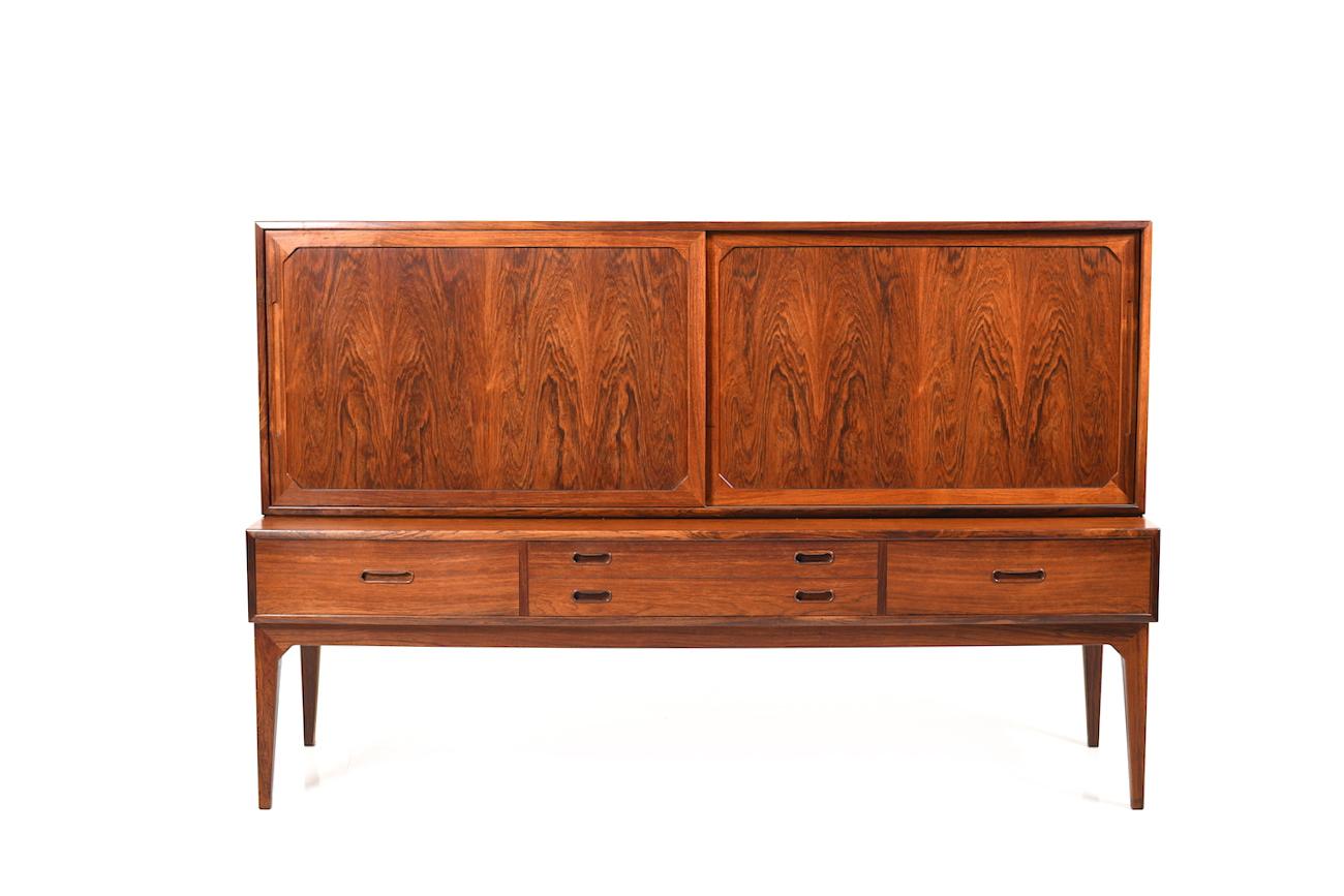 Midcentury Danish rosewood highboard by Severin Hansen for Haslev Møbelsnedkeri 1960s. Front with 2 sliding doors, with shelves behind. In the lower part with drawers, Denmark, circa 1960-1963.