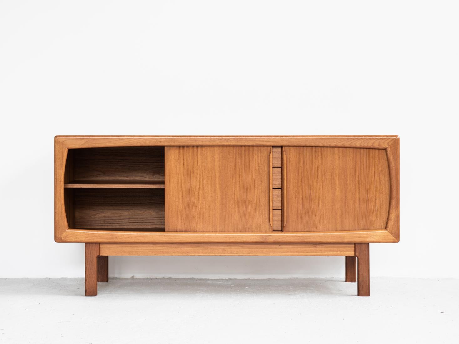 Midcentury sideboard made by Burchardt Nielsen in Denmark in the 1960s. It is the smaller model. The drawers are in the style of Arne Vodder. This sideboard is often attributed to HP Hansen or Dyrlund, but we know it has been made by Burchardt