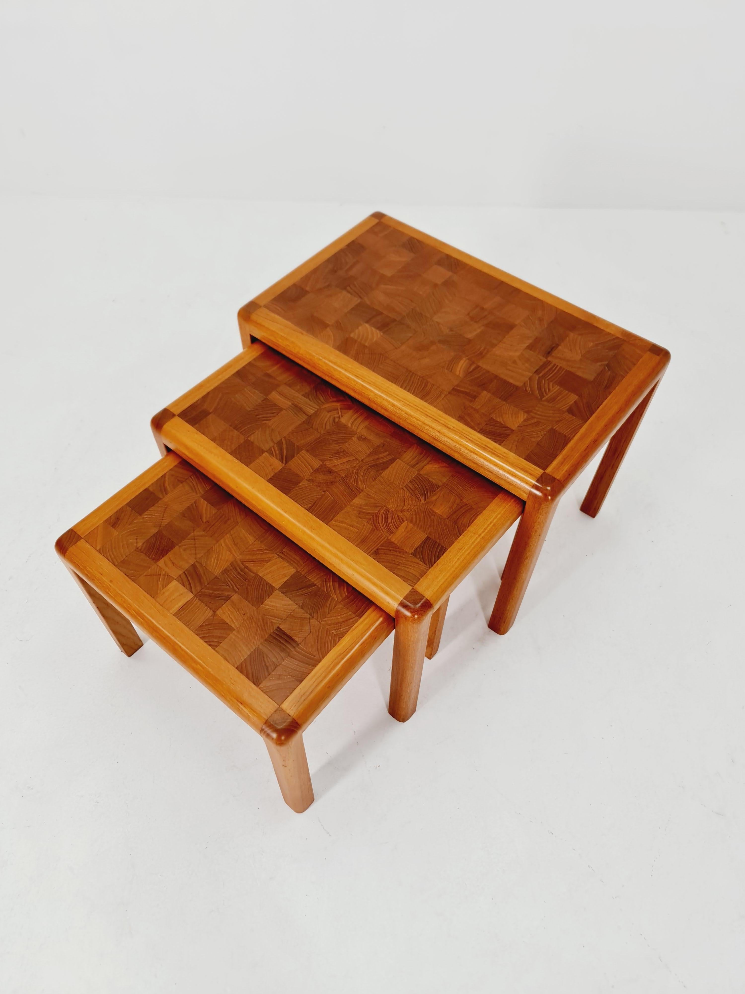 Midcentury Danish  Solid  teak Nesting Tables by Rolf Middelboe , 1960s

Made in Denmark  

Amazing condition, no scratches or damage. 

Usable as a additional tables in the living room

Measurements big table:
Depth: 39  cm
Height: 43  cm
Width: 