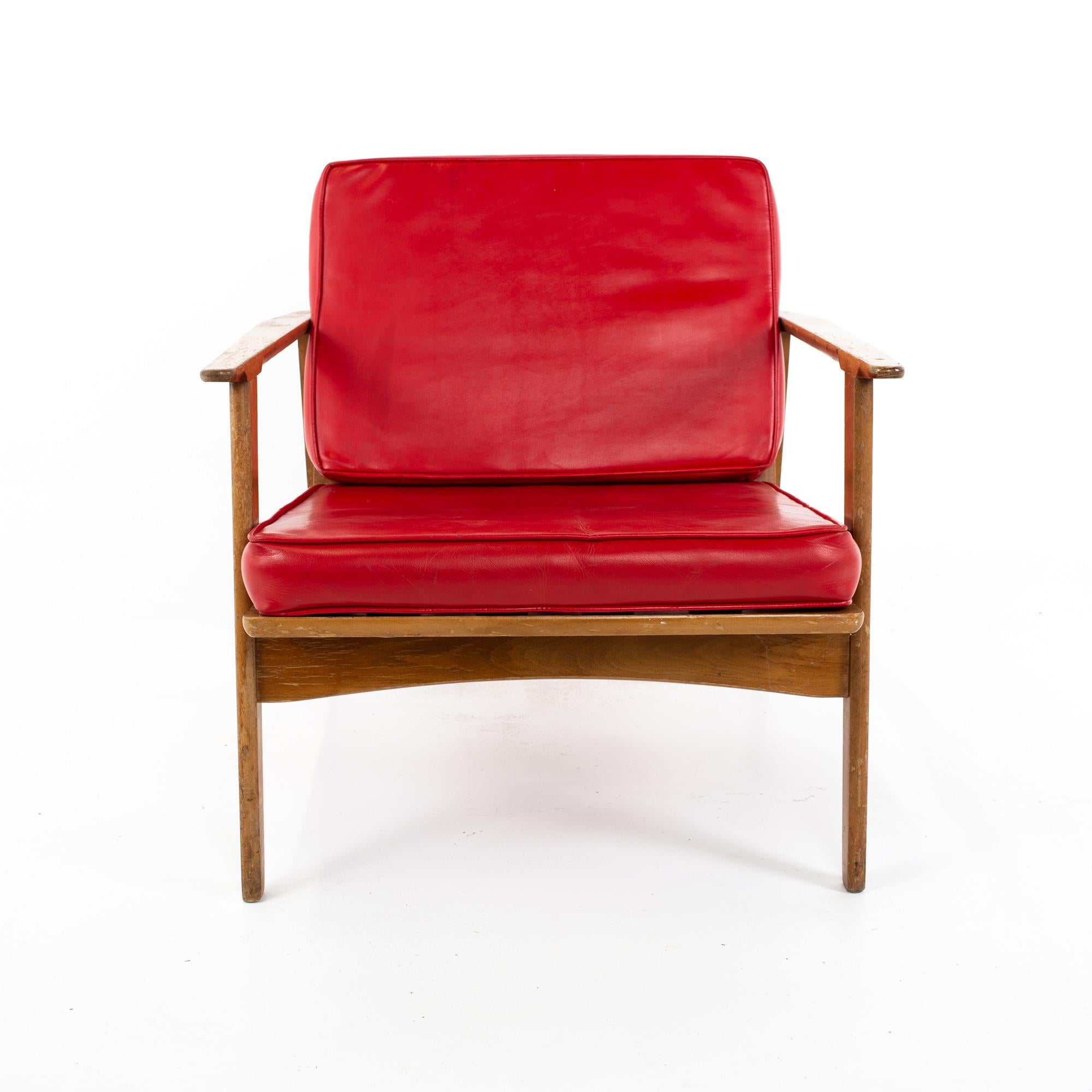 Mid Century Danish style walnut lounge chair 
Chair measures: 25 wide x 32 deep x 27 high, with a seat height of 16 inches

This piece is available in what we call restored vintage condition. Upon purchase it is thoroughly cleaned and minor repairs