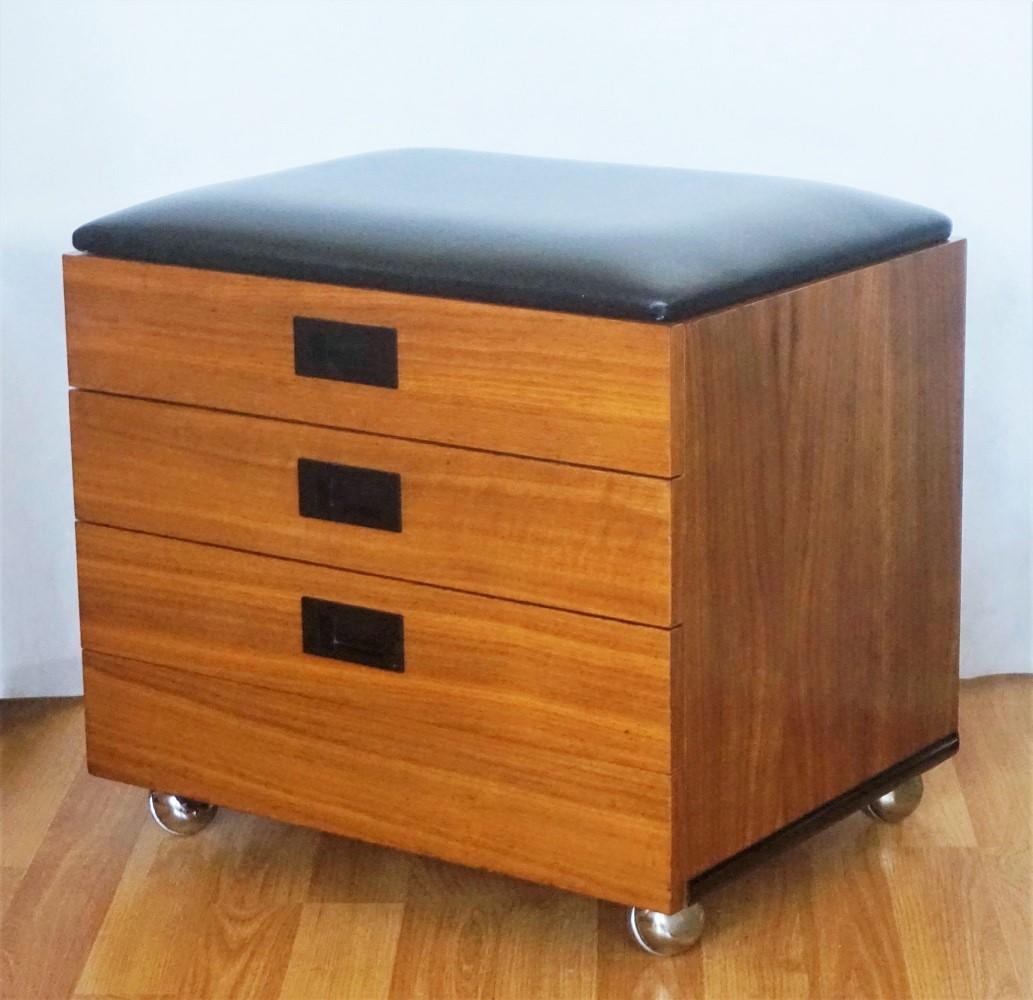 Striking midcentury Danish design storage stool, multifunctional with a removable top offering useful storage and two additional drawers. One of the drawers has a solid plastic divided interior as sewing storage box or for other small items. The