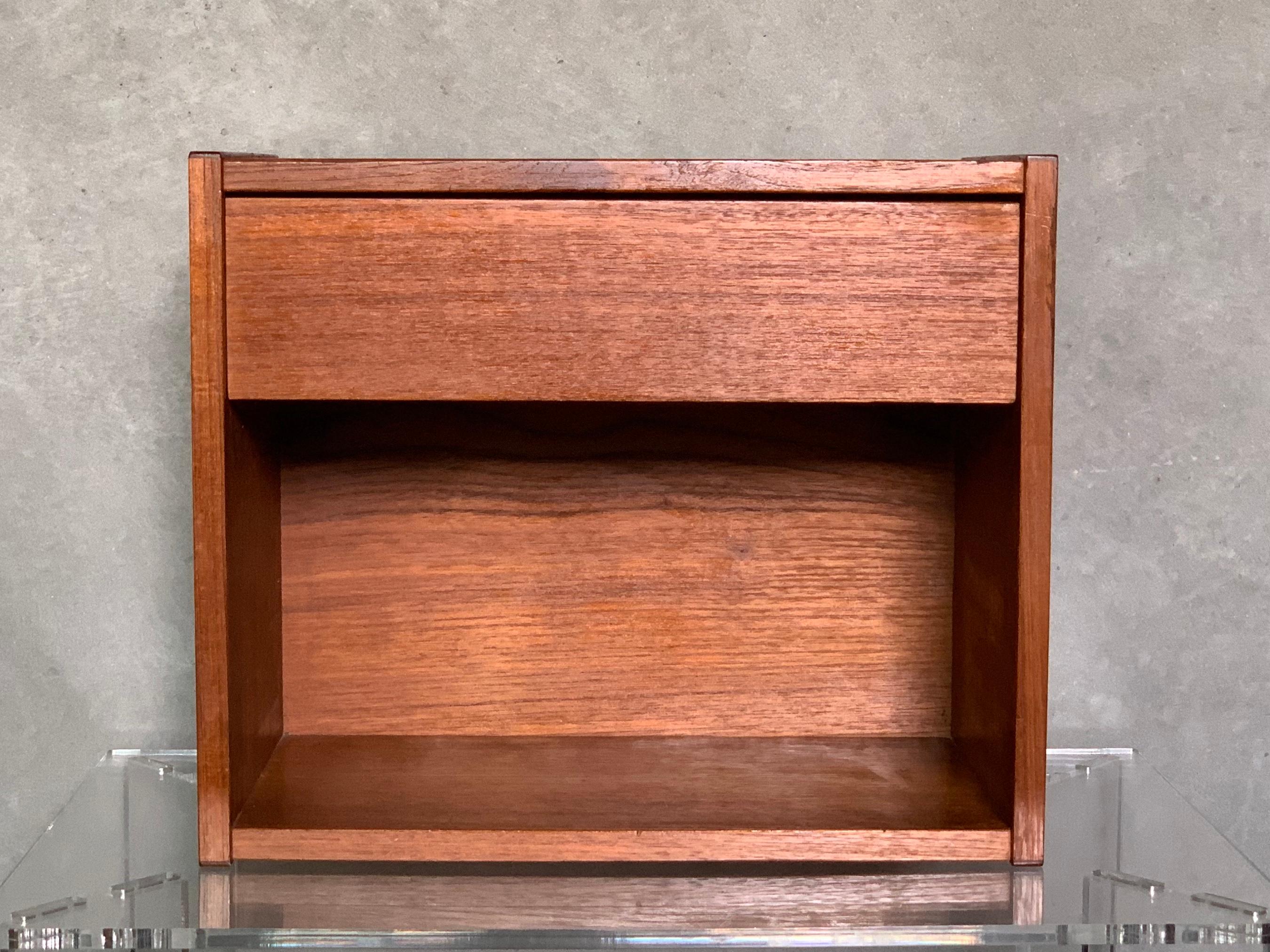 Wall-mounted bedside table in teak designed and manufactured in Denmark, 1960s.