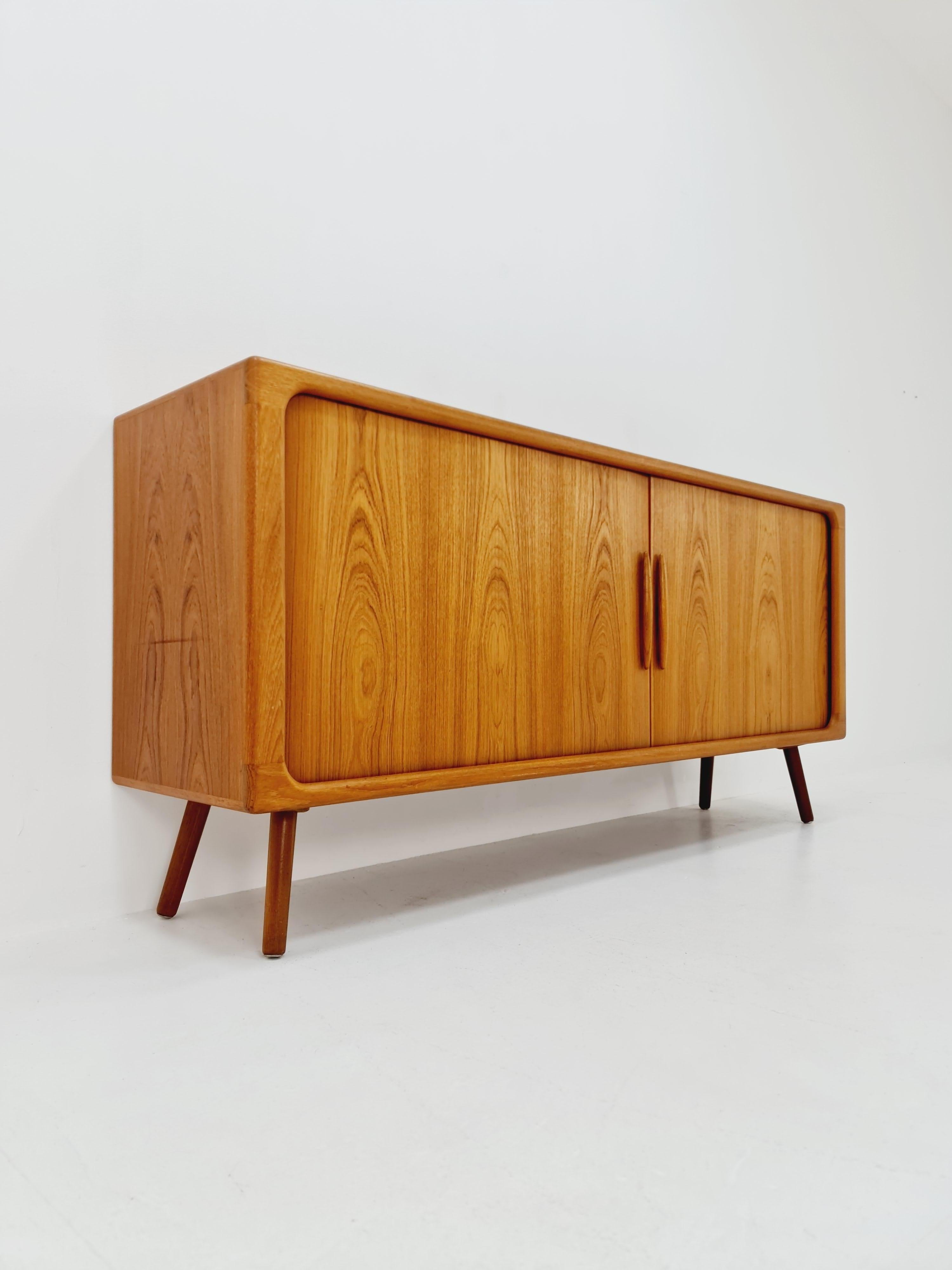 Midcentury Danish Teak Sideboard by Dyrlund , 1960s

Danish Design

Dimensions: 
48   D x 190  W x 91  H cm

It is in good vintage condition, however, as with all vintage items some minor wear marks should be expected.

Please inquiry for prices to