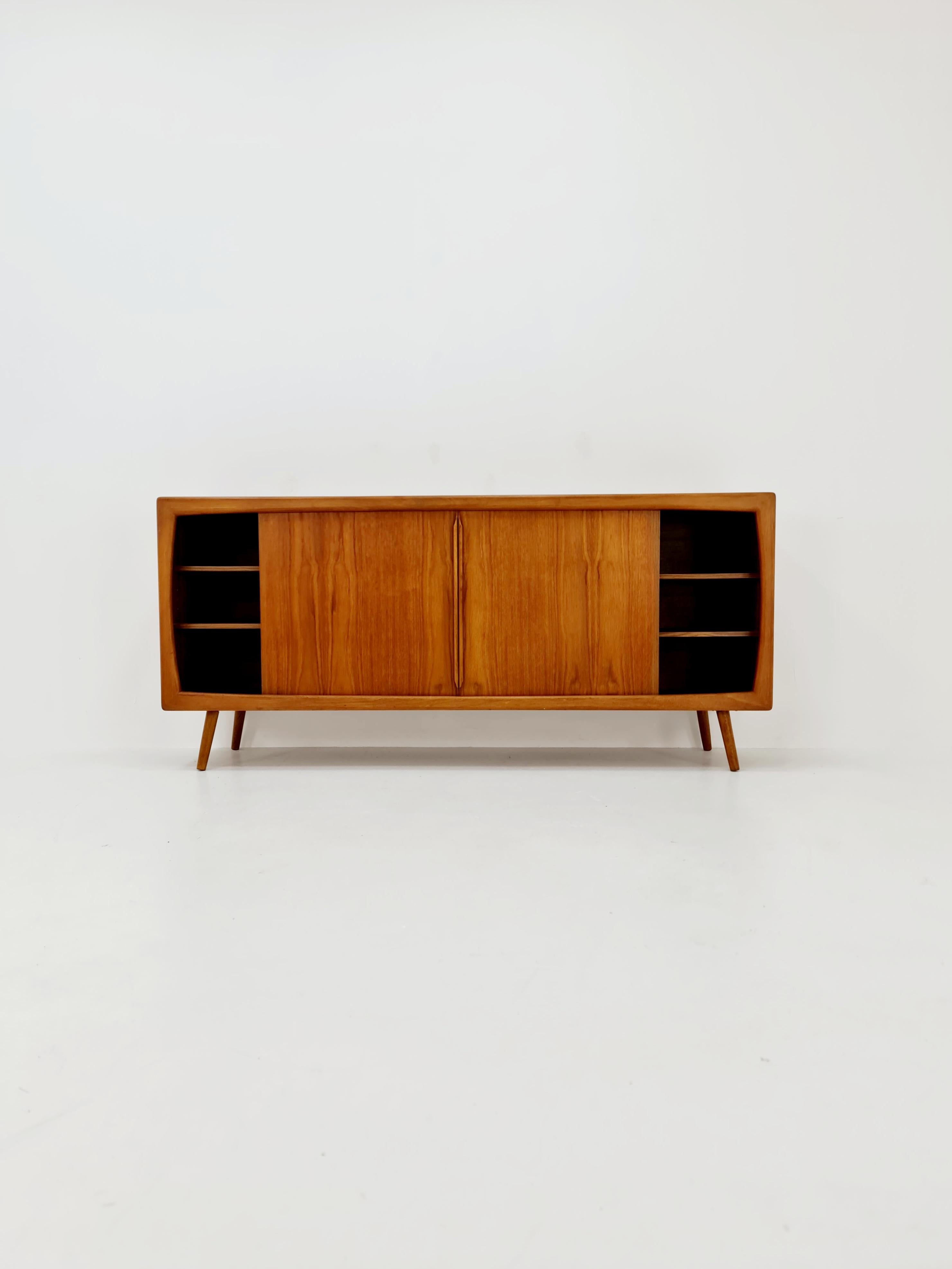 Midcentury Danish Teak Sideboard by Dyrlund , 1960s

Danish Design

Dimensions: 
50  D x 200 W x 91  H cm

It is in good vintage condition, however, as with all vintage items some minor wear marks should be expected.

Please inquiry for prices to