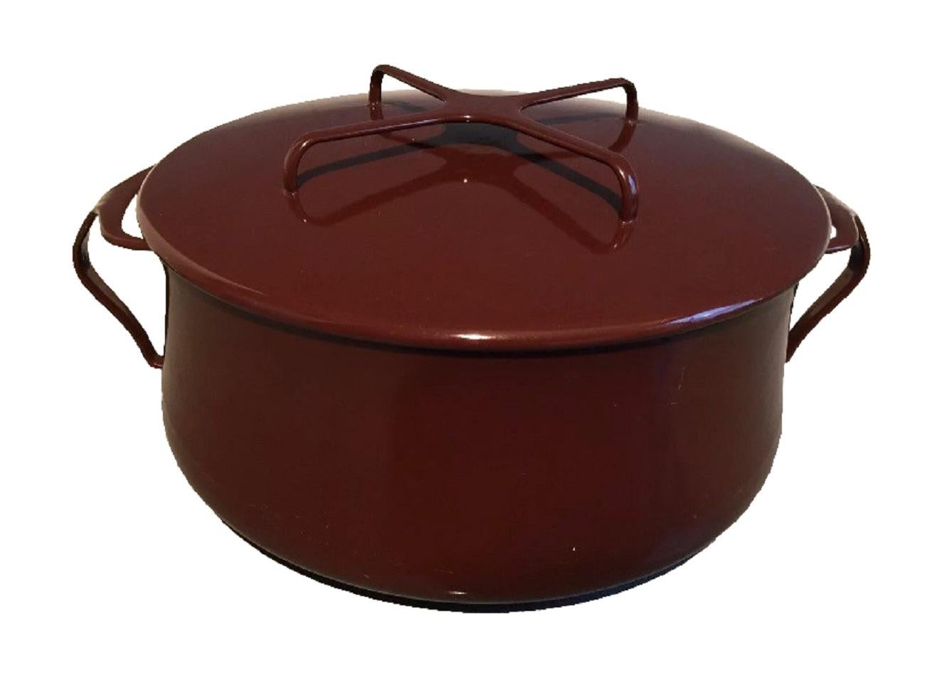 A Dansk Kobensyle Dutch oven / stock pot and lid in brown with white interior.  Steel with enamel finish. France, circa 1960.

Stamped on underside of pot; 