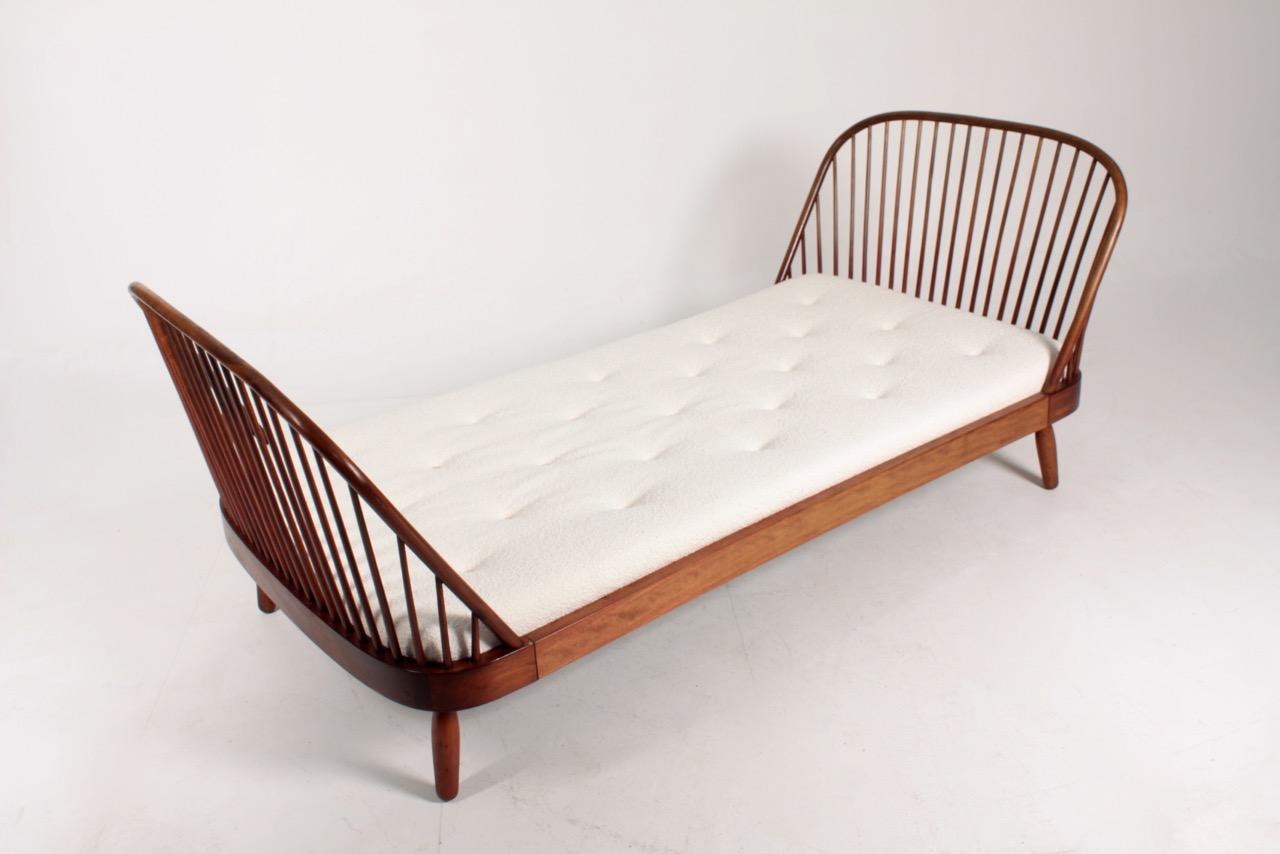 Great looking daybed in solid beech, designed by Maa. Frode Holm for Illums Bolighus in the 1940s. Made in Denmark by H&F Tremmeværk cabinetmakers. Great original condition.