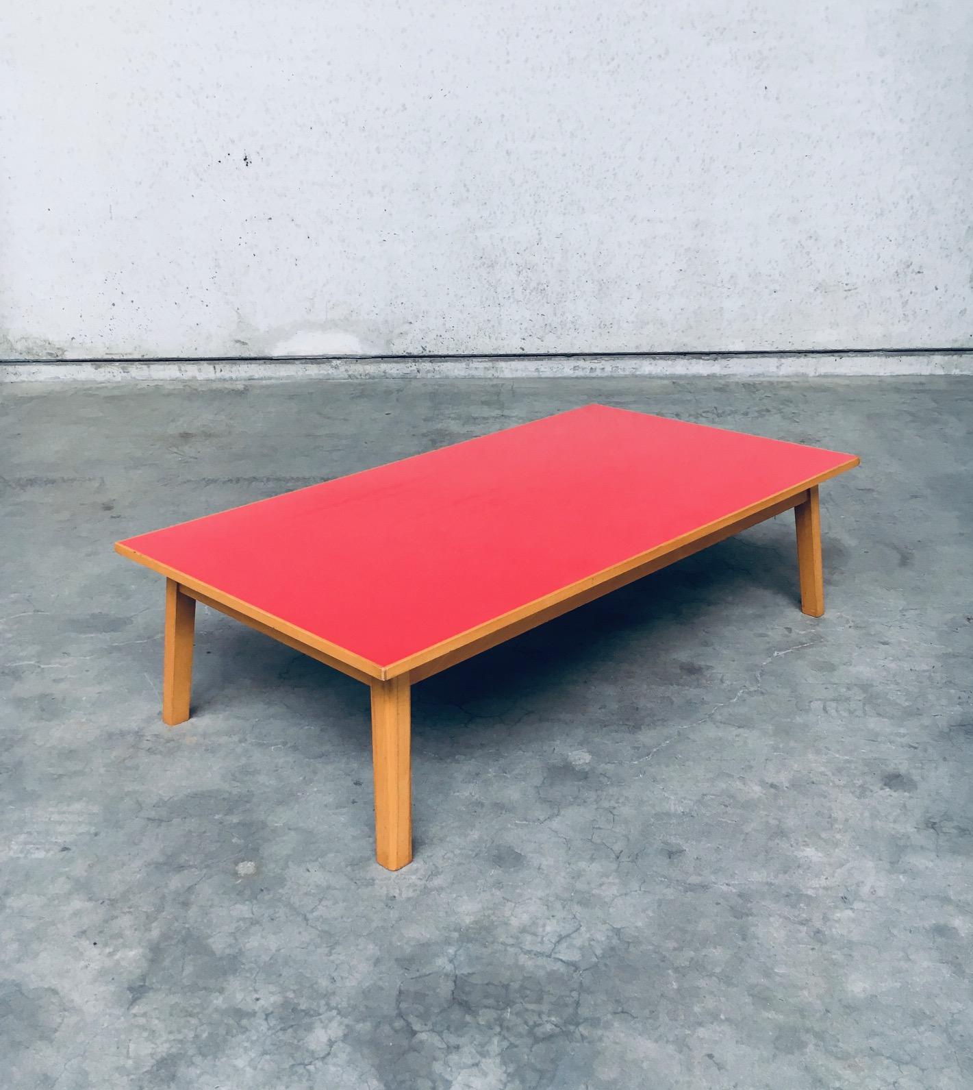 Vintage Midcentury Modern Belgian Design Red Formica / Laminate Coffee Table. Made in Belgium, 1950's / 60's period. This was once a kitchen table and has been cut down to a coffee table height. This is a certain eyecatcher and comes in very good