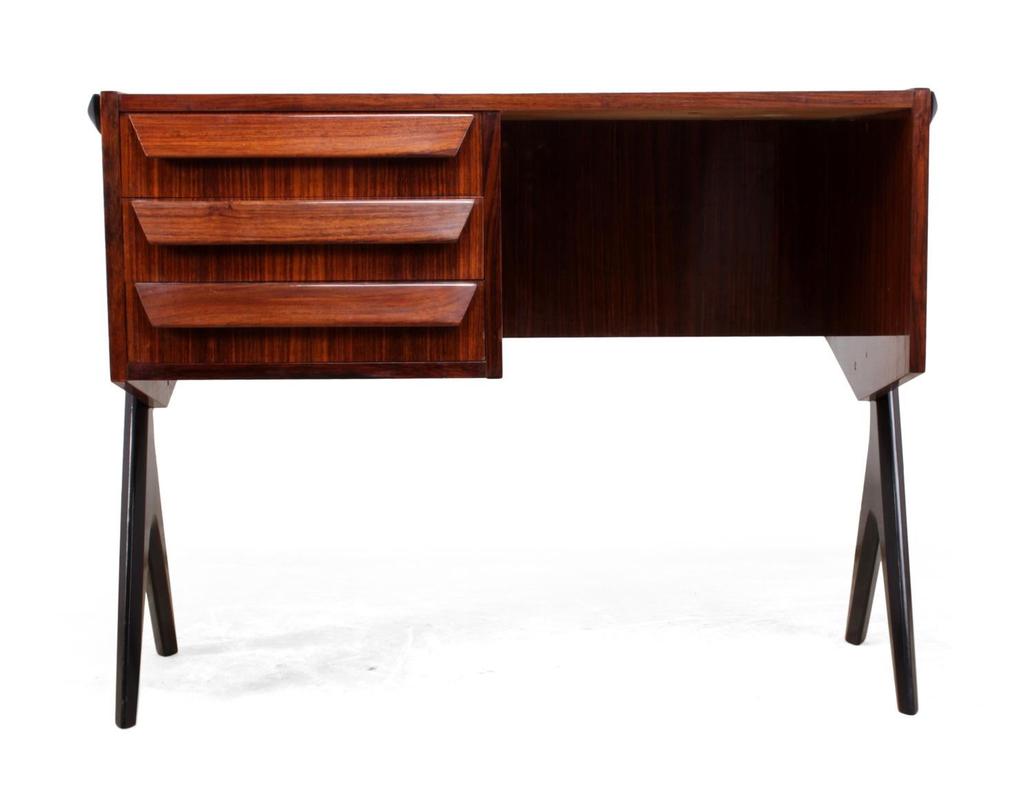 Midcentury desk in rosewood Italian, circa 1950
produced in Italy in the 1950s this desk has three drawers to the left hand side and Ico Parisi style legs the desk is in excellent condition throughout

Age: 1950

Style: Italian MCM

Material: