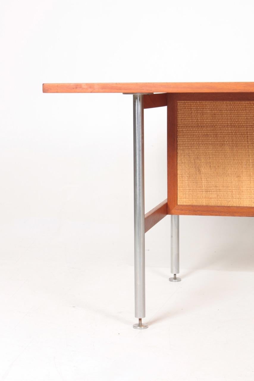 Great looking freestanding desk in teak. Designed by Kai Kristiansen. Original condition.