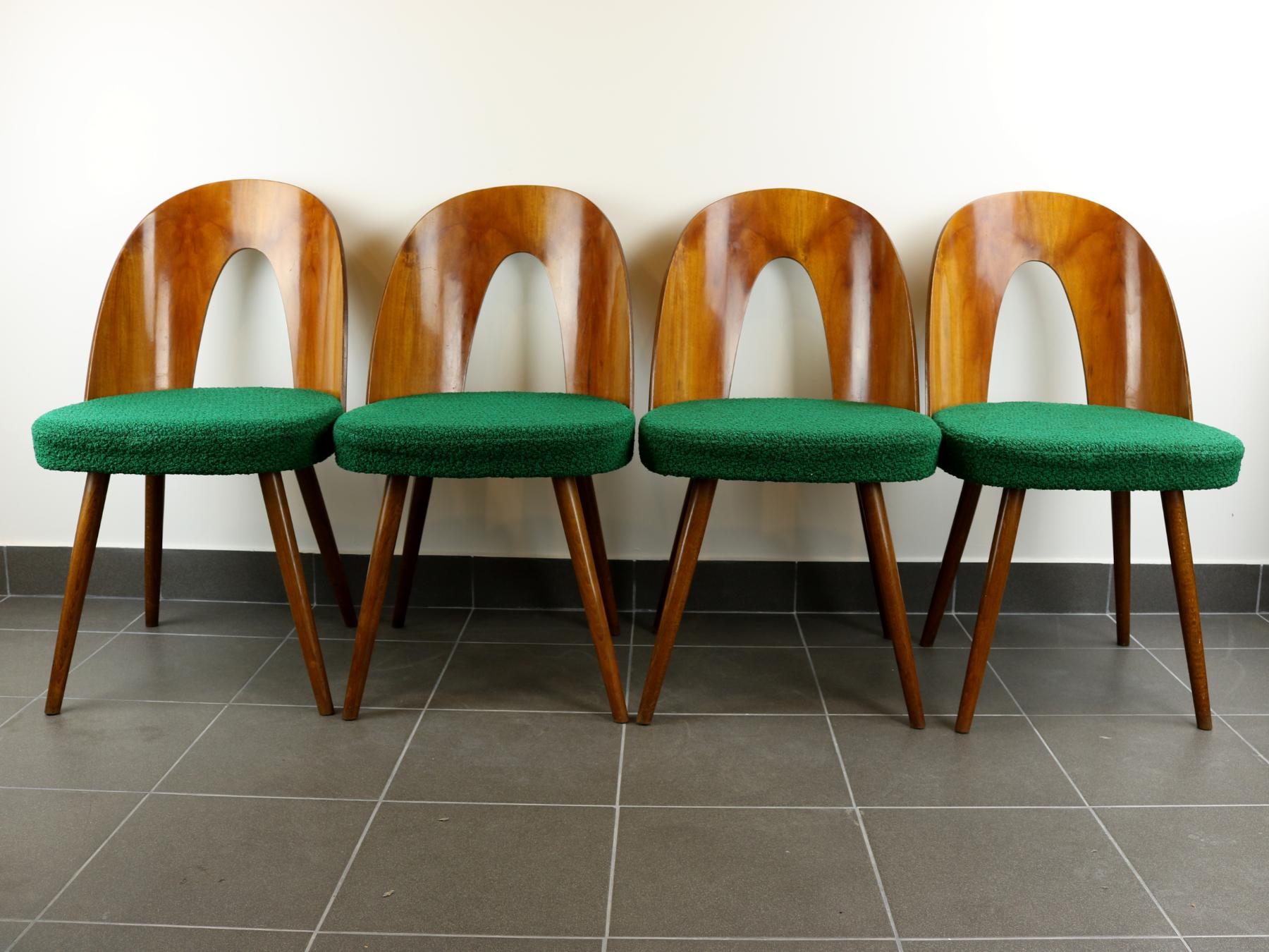 These chairs were designed by Antonin Suman, and were manufactured by the Tatra Nabytok Company, in the 1960s, in Czechoslovakia. Their green original fabric is still in perfect condition.