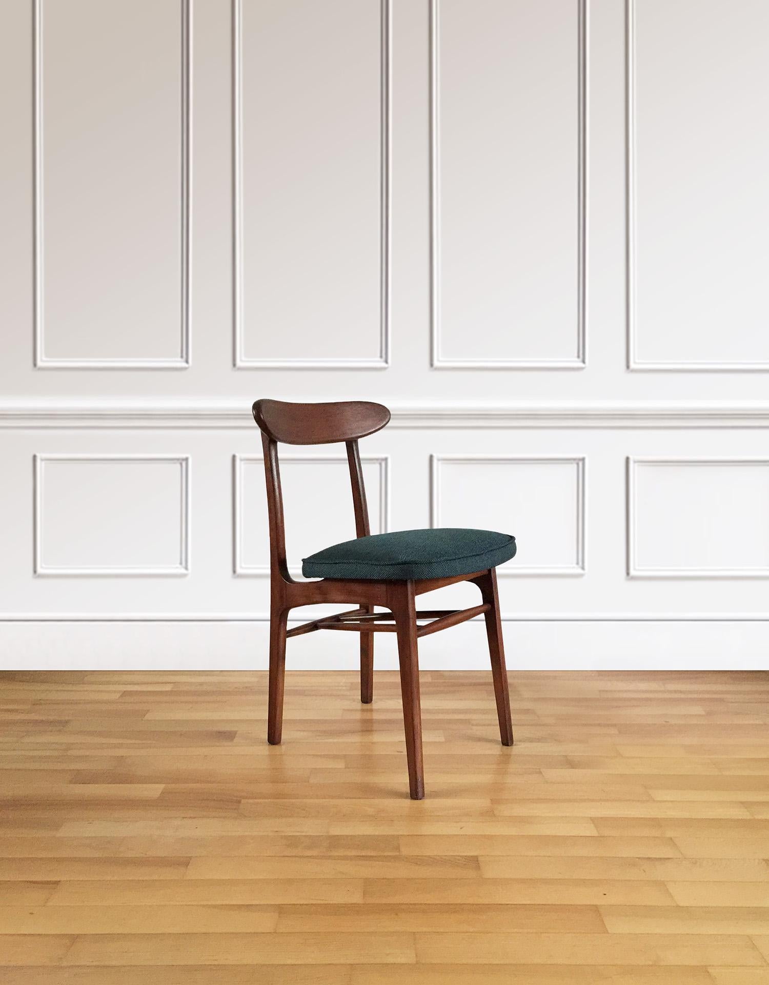 This set of two chairs, model 5908, was designed by Rajmund Teofil Halas, one of the most recognizable projects of Polish design in the 1960s. The chairs have a simple, modernist silhouette. The construction is made of beech wood, new upholstery
