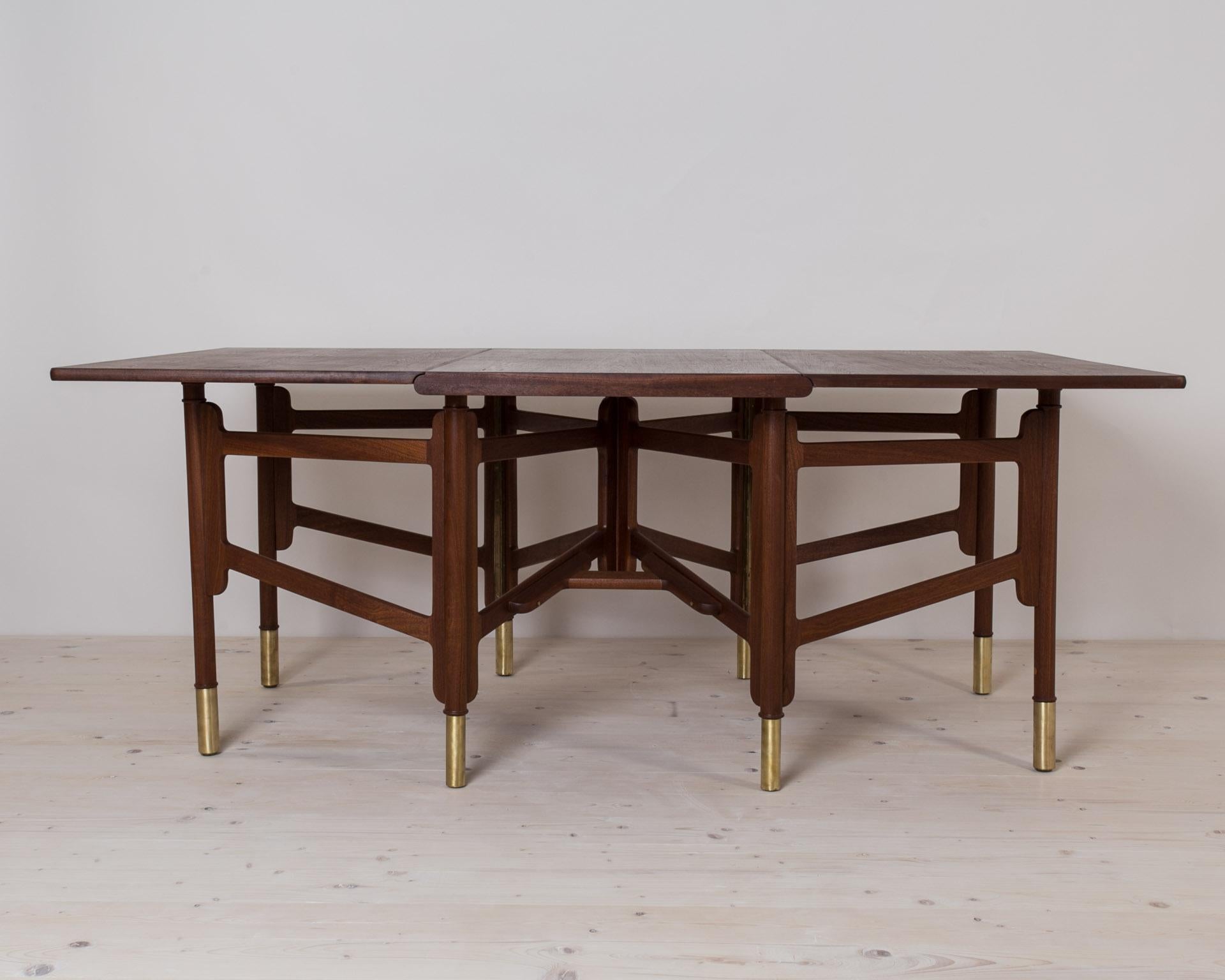This gorgeous table was made in 1950s by Norwegian company Hiorth and Ostlyngen. Some suspect that famous Alf Sture might have been somehow involved in designing this table, but there is no officially documented confirmation so far. Neatly designed