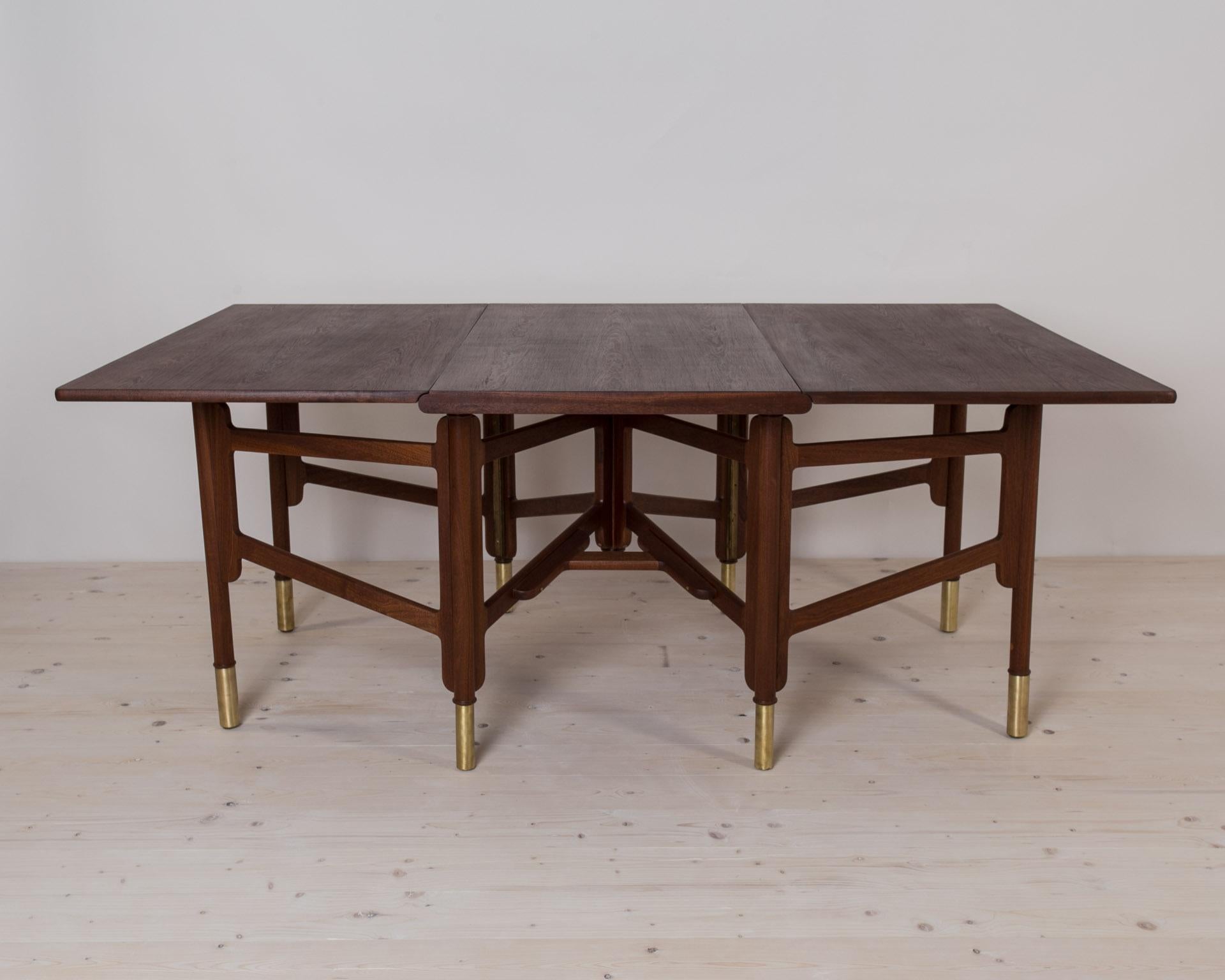 Scandinavian Modern Midcentury Dining Table, Teak Wood, Brass Elements, Norway, 1950s For Sale