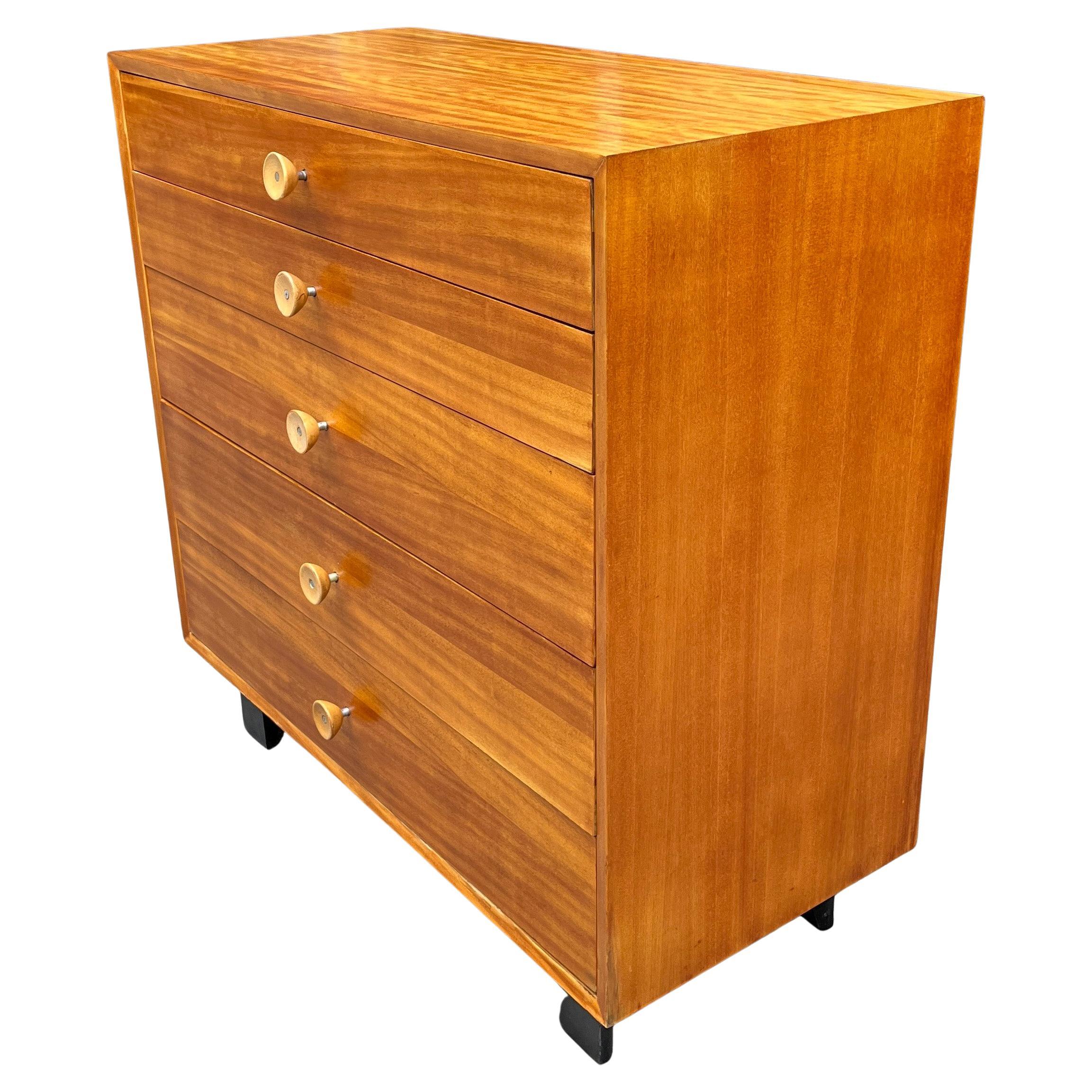 Basic Cabinet Series 4620 BCS
Gorgeous Mid-Century Modern highboy dresser designed by George Nelson for Herman Miller. The dresser features five graduated drawers. Part of Herman Miller's collection of modular basic storage components. The chest has