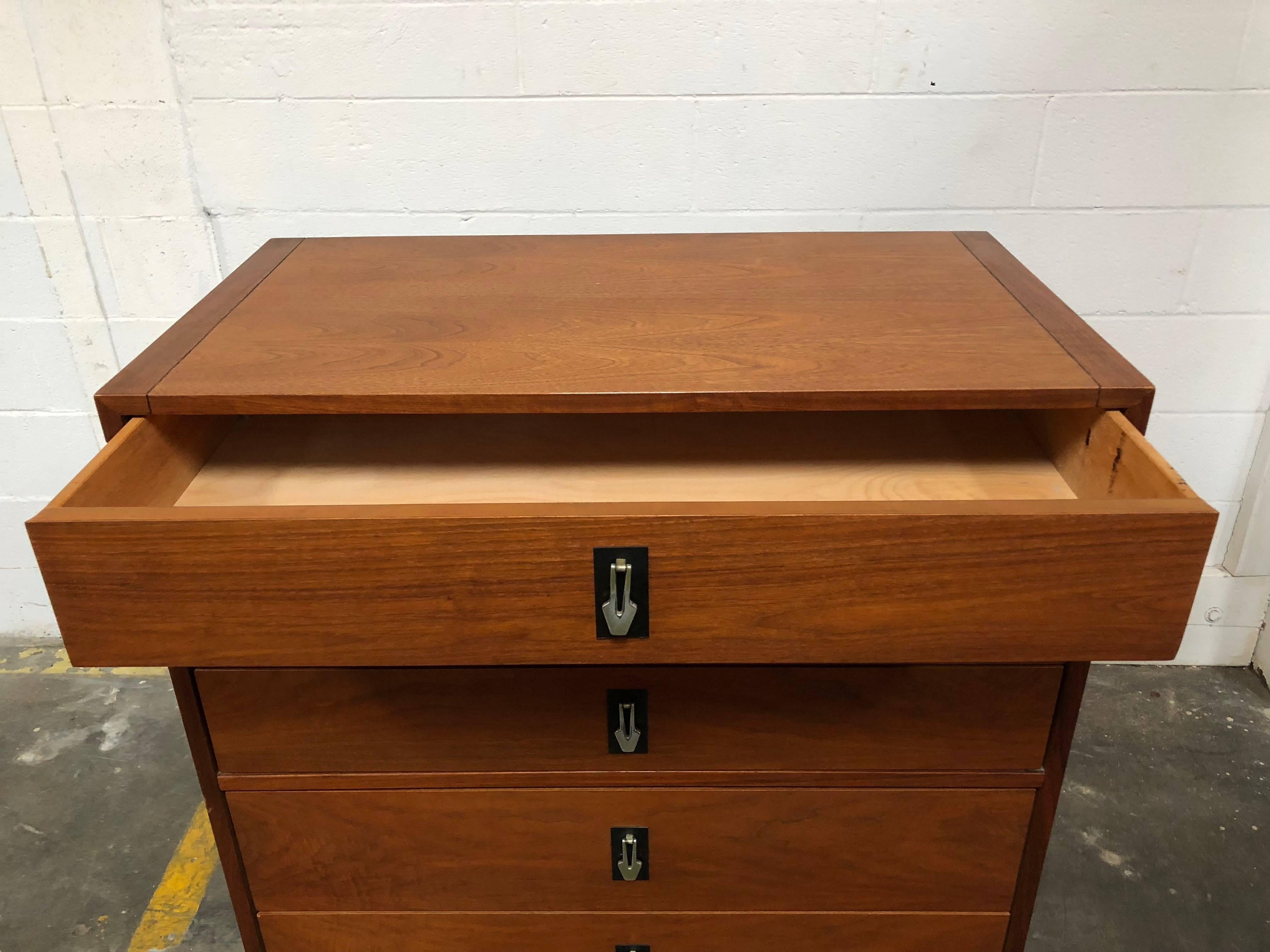 This dresser was handcrafted by the well-loved Brown Saltman (see photo of maker's mark).
Very unique with metal pulls for the drawers. This piece is vintage, but timeless.