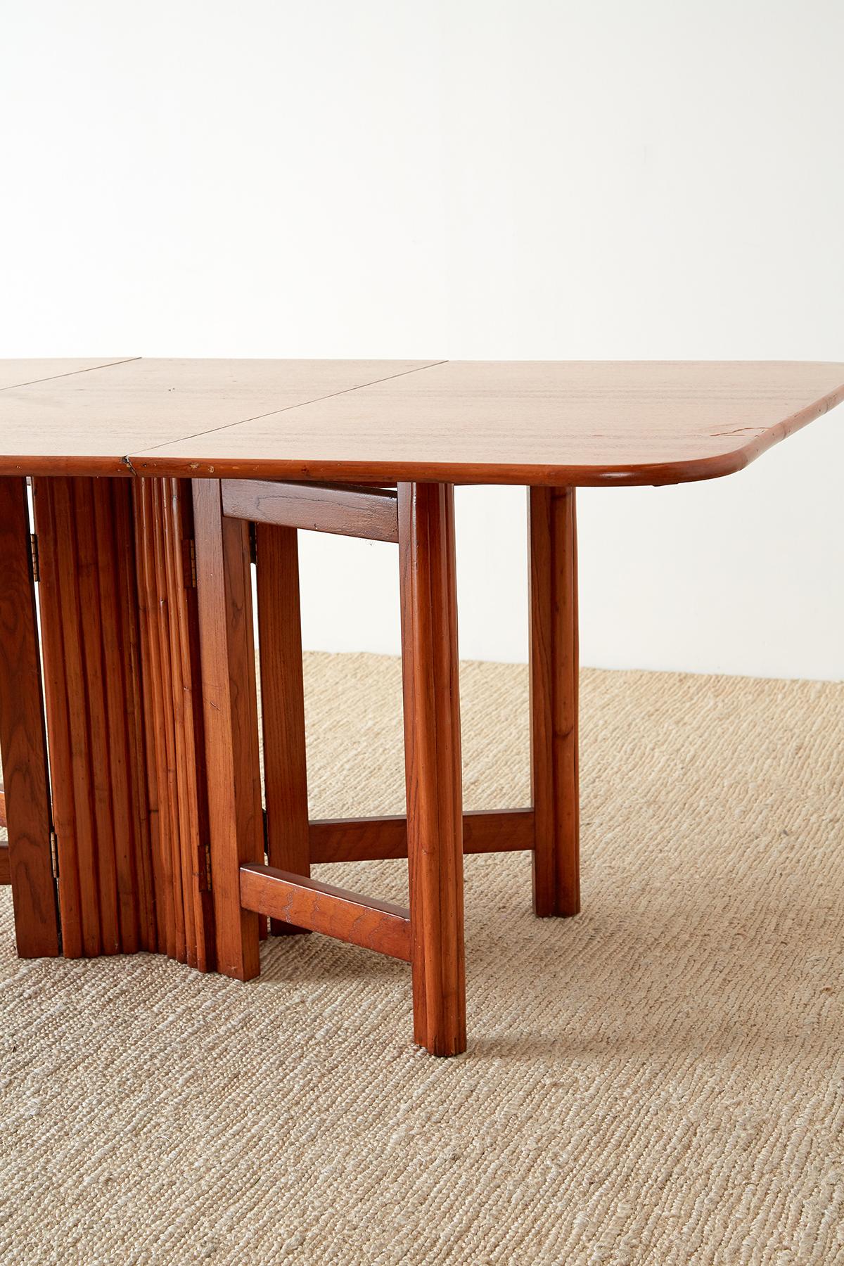 Midcentury Drop-Leaf Dining Table with Rattan Base For Sale 3