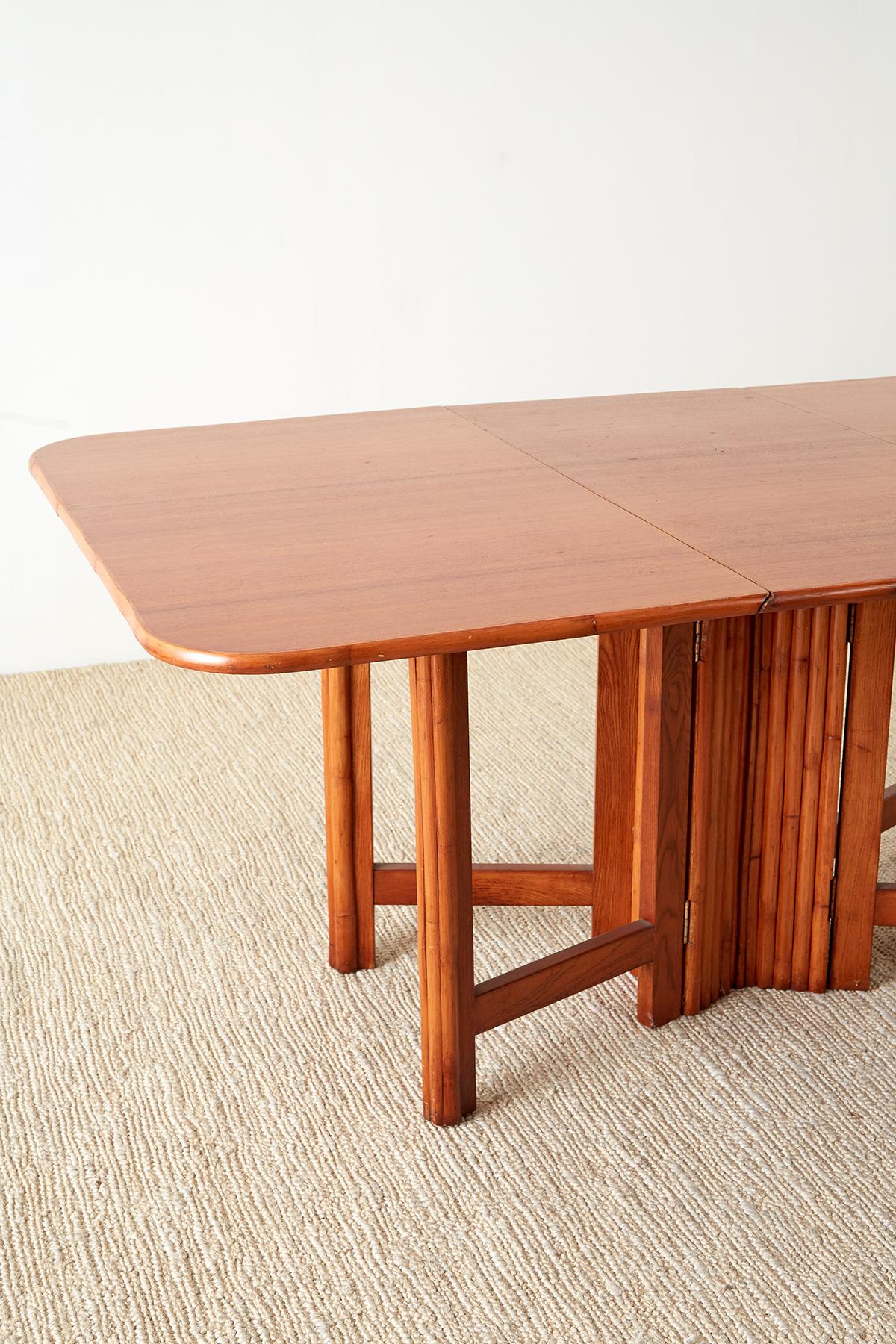Hand-Crafted Midcentury Drop-Leaf Dining Table with Rattan Base For Sale
