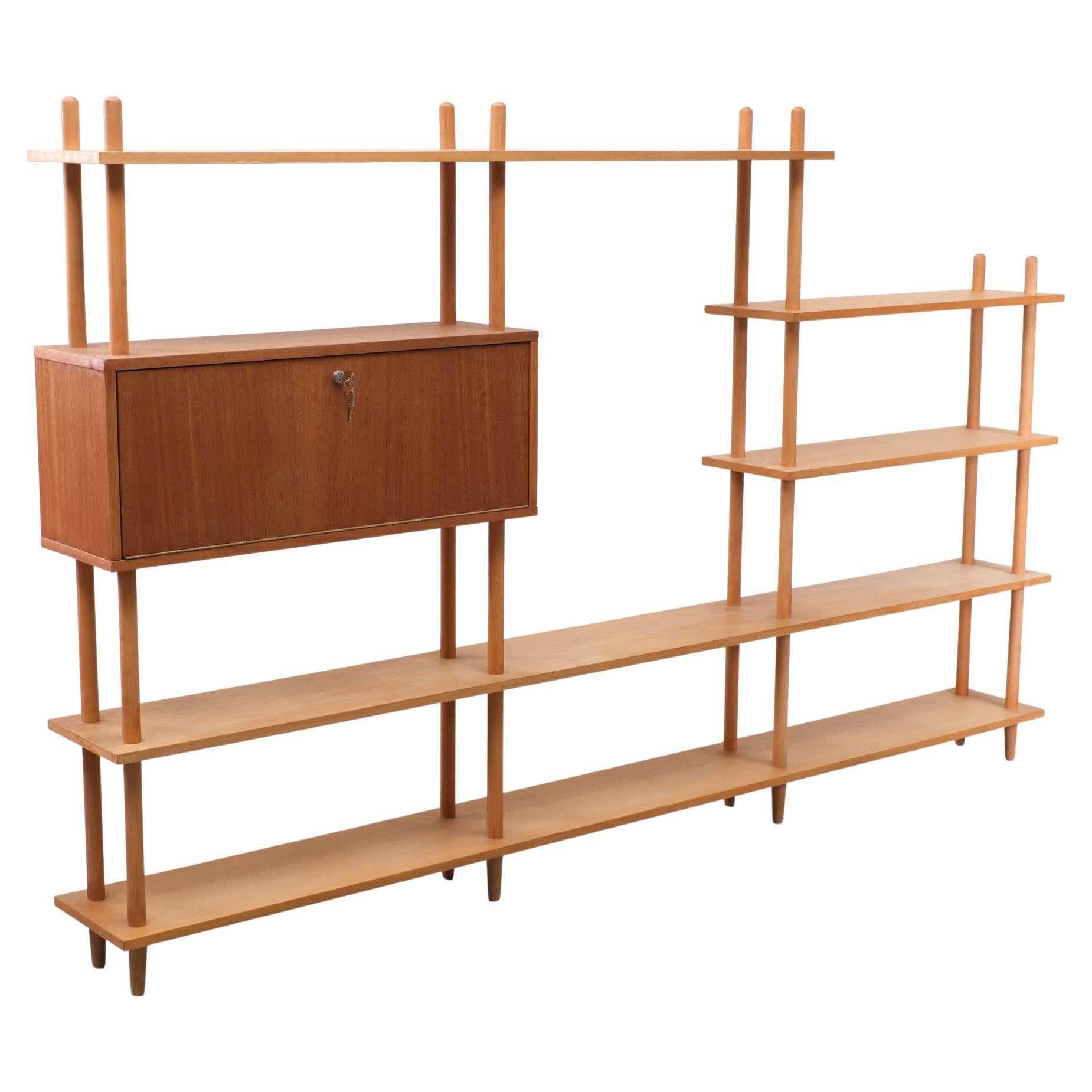 Vintage stick cabinet. A design by Willem Lutjens for Den Boer Gouda, the Netherlands, 1960s. One cabinet with lock.  The Beechwood shelves are pure ,so no lacker or wax .
Beechwood  cabinet with clean lines, can be used as a bookcase against the