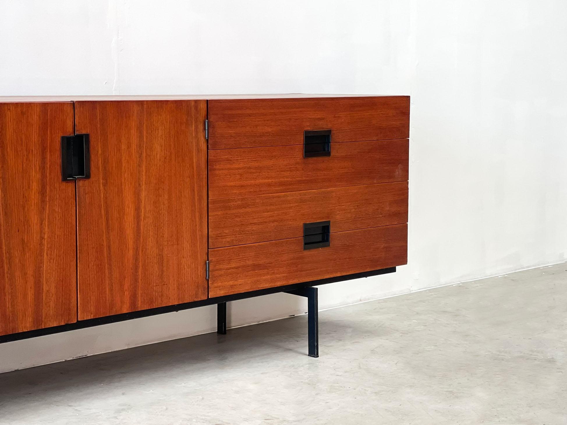 Pastoe DU03 sideboard by Cees Braakman
A true Dutch design icon.

The DU03 is one of Pastoe's best known but also most desirable sideboards. Cees Braakman designed this sideboard in the late 60s.

The sideboard has a very nice veneer with a