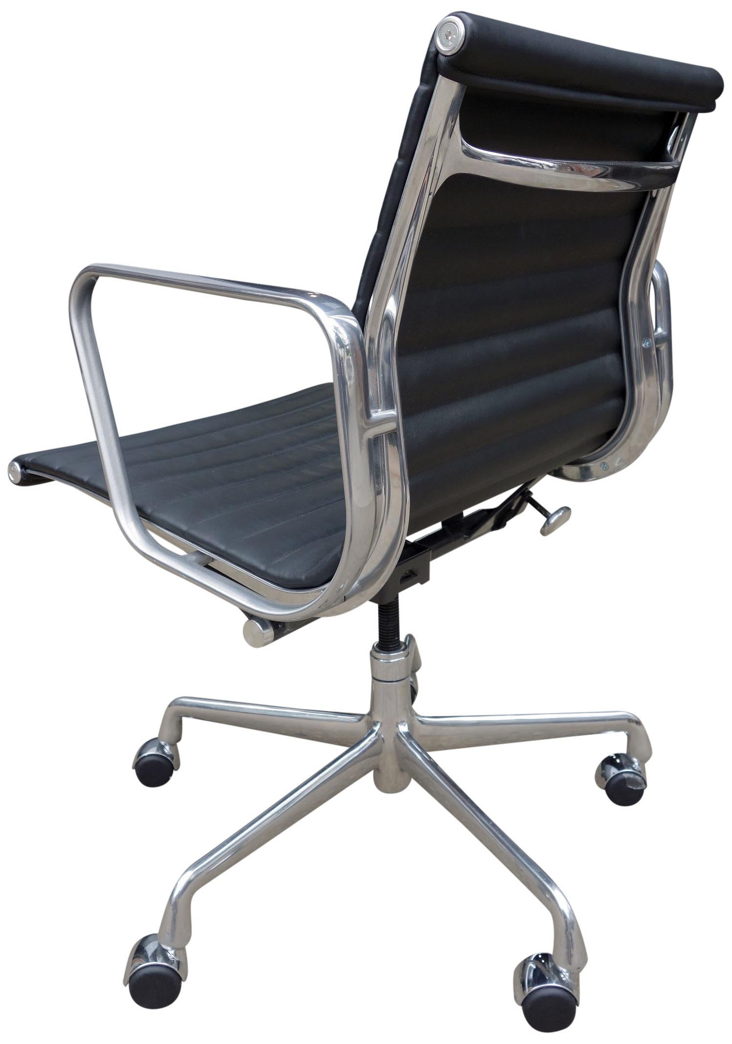 For your consideration are Eames Aluminum Group chairs in black vegan leather for Herman Miller. All in very good original condition showing minimal wear. With tilt and height adjustment.