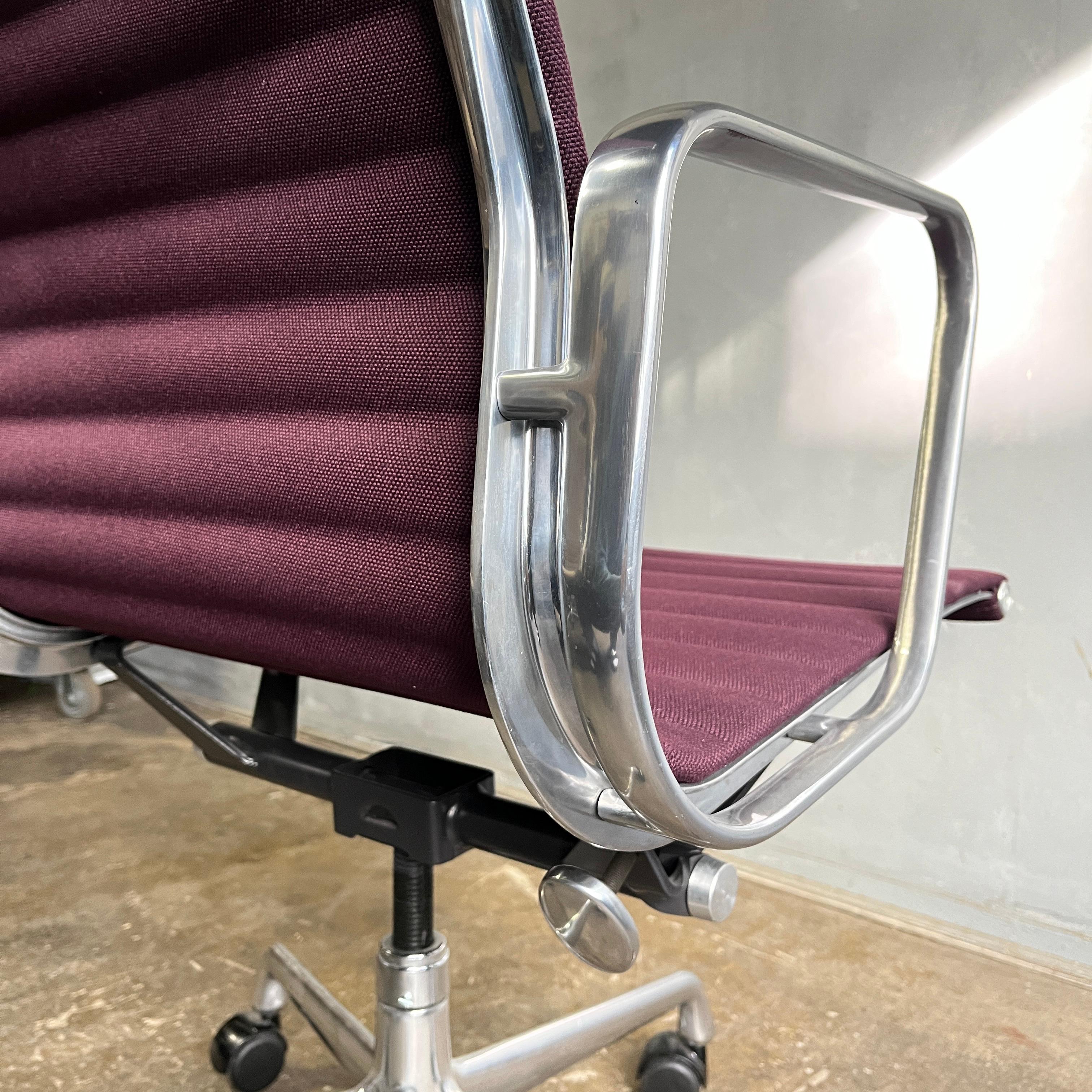 For your consideration are a set of 4 Eames side chairs upholstered in gorgeous purple fabric. Elegance and comfort separates this iconic chair from the rest. The upholstery is in wonderful condition with the arms having some minor scuffs and dings