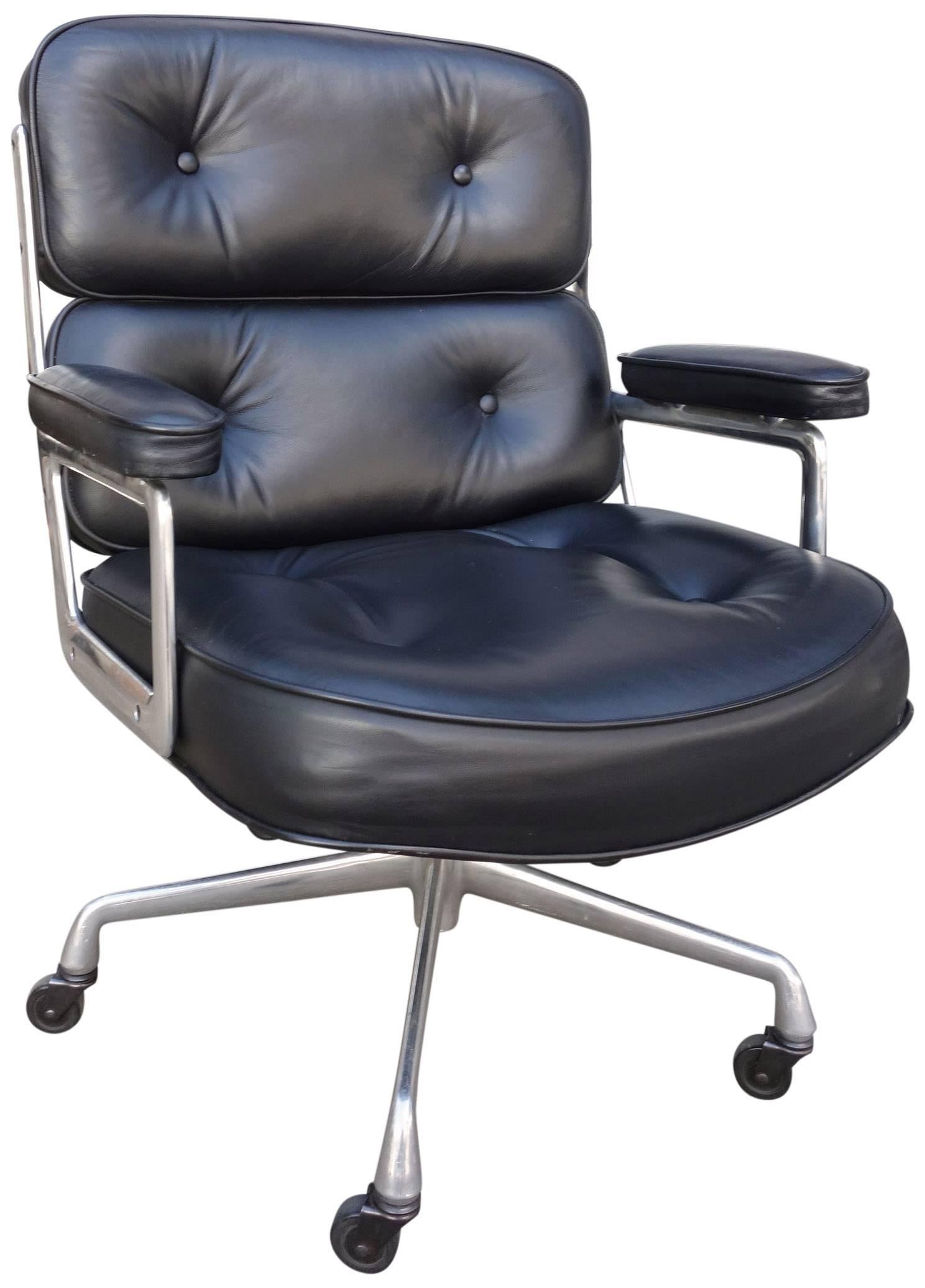 Eames designed chairs for New York's Time-Life Building in the late 1950s. These examples are from the late 1990s. Different then the aluminum group / soft pad chairs, this chair is the most luxurious executive chair available. The top grade black