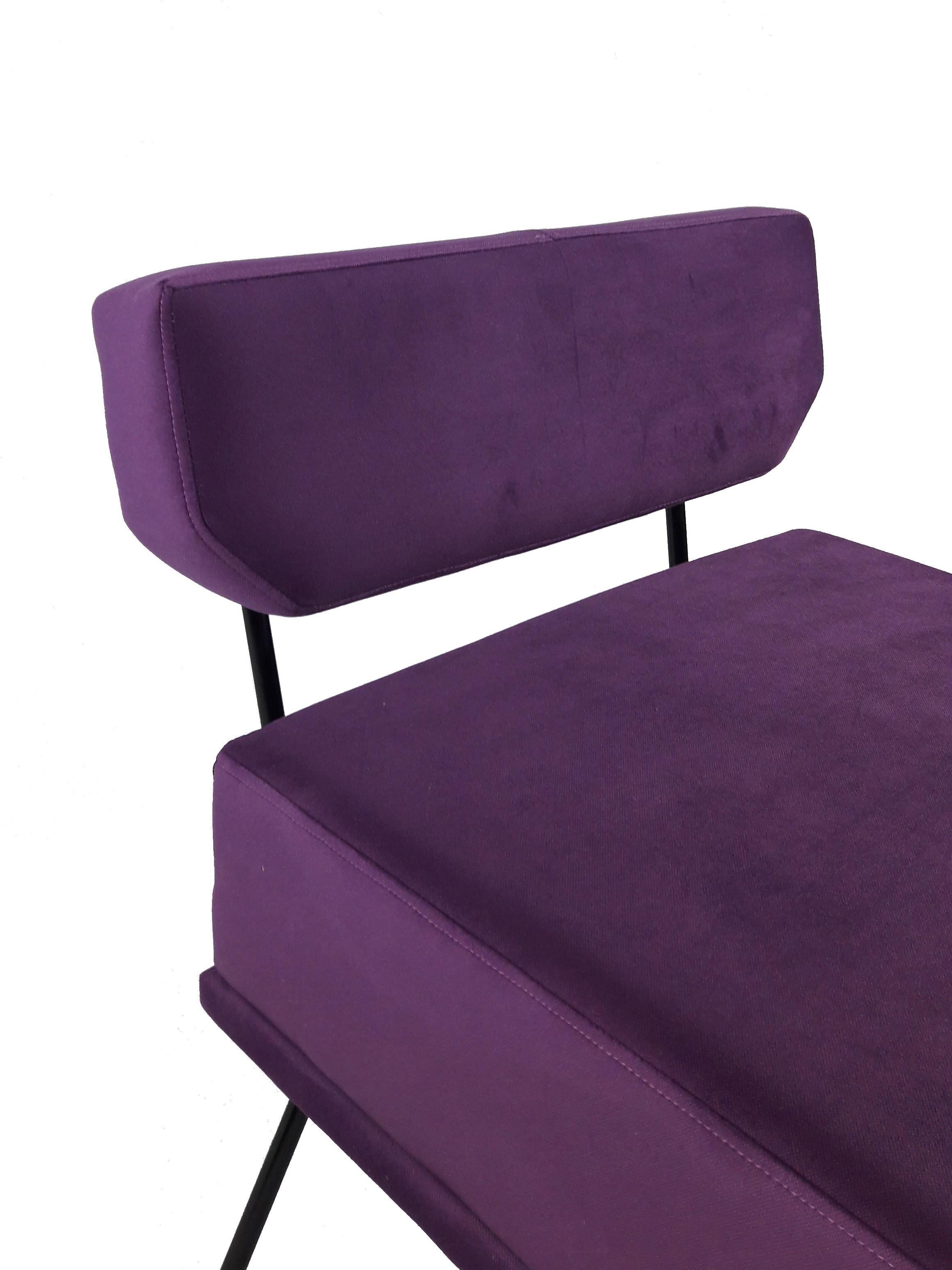 A stunning violet armchair, made in Italy in 1950s, inspired by studio BBPR's timeless 'Elettra' armchair, it is characterized by a sober line and comfortable form.
The structure is in tubular black enameled iron, the seating is reupholstered in