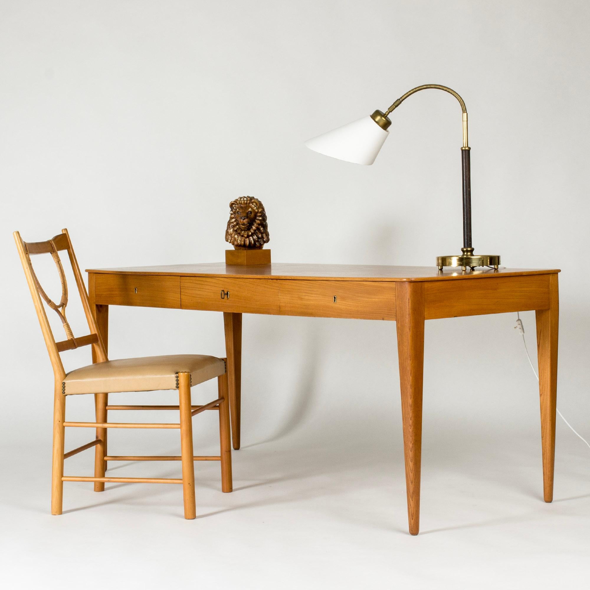 Beautiful desk by Josef Frank, made from elm with striking woodgrain. Clean lines and subtly rounded forms, a timeless piece.