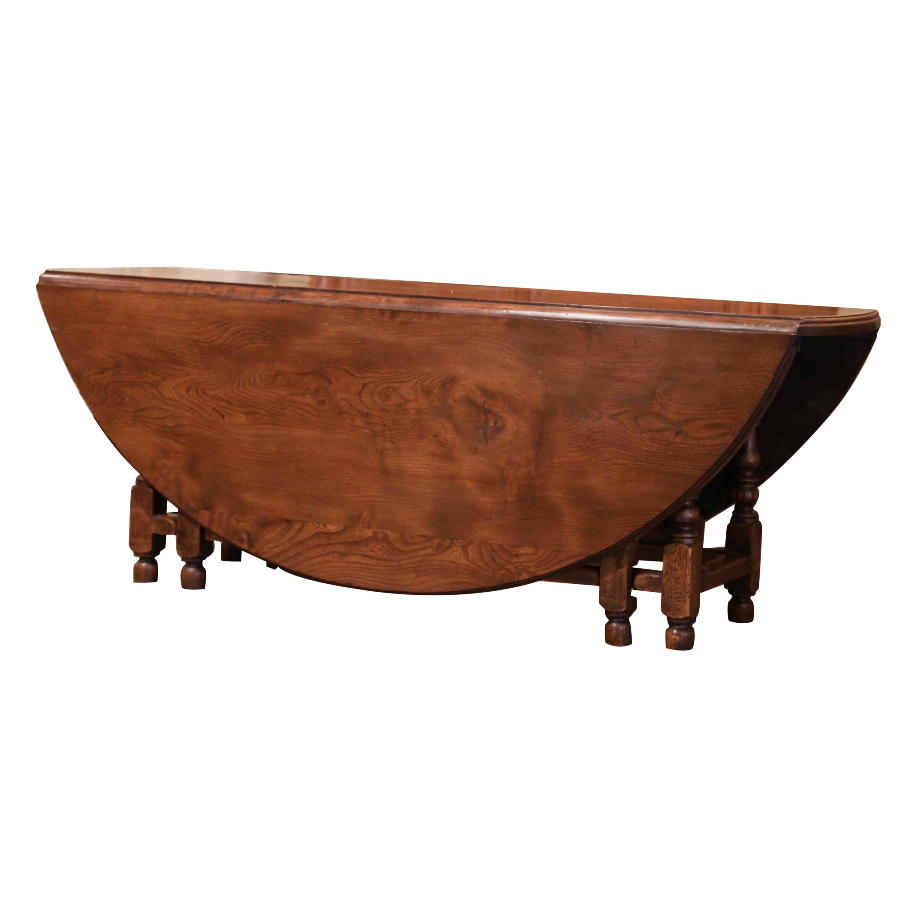 Midcentury English Carved Chestnut Eight Gate-Leg Drop-Leaf Oval Table