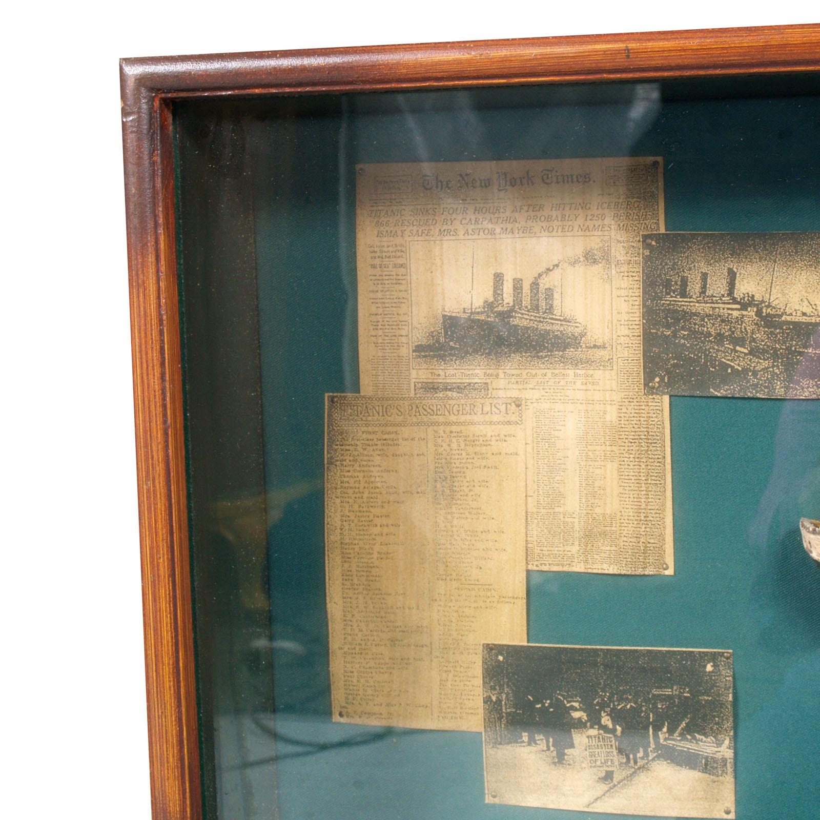 1960s model of the Titanic ship on display case with newspaper clippings describing the event.

Measures: H 34 x W 108 x D 9 cm.