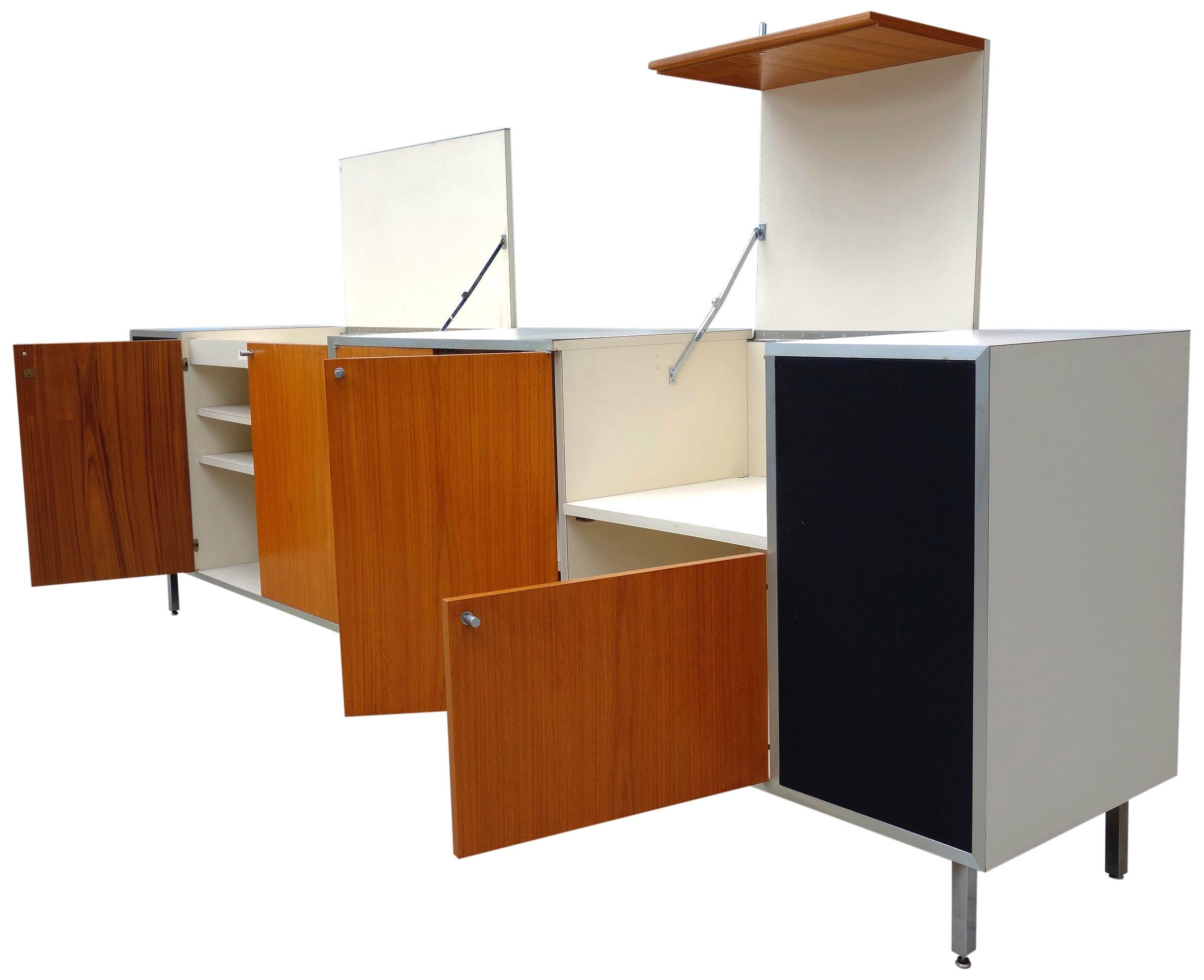 For your consideration is this wonderful and substantial entertainment credenza featuring space for all your sound gear and room for a bar. Both ends of the unit provide room for your speakers. A great addition for an audiophile! Dating from the