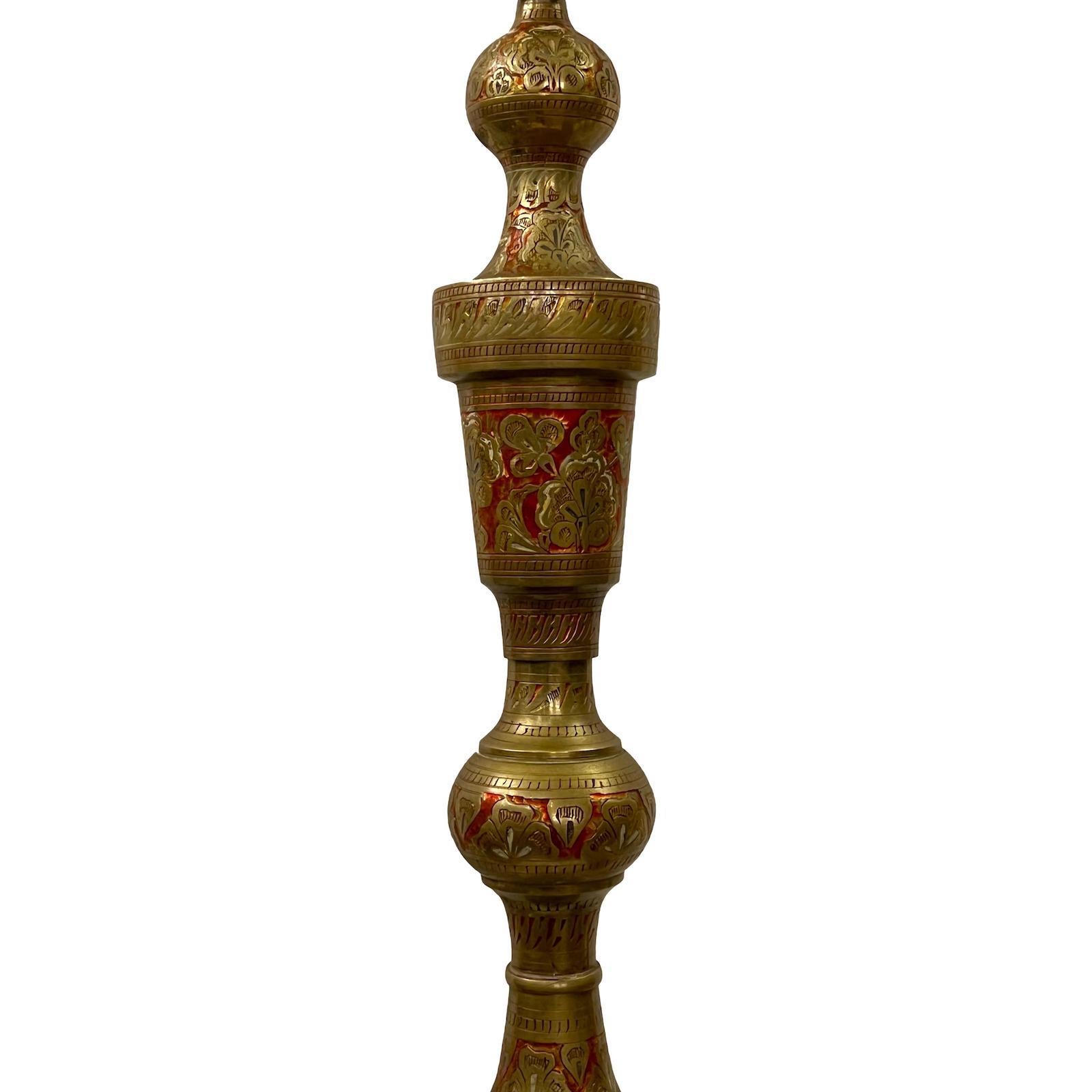 A circa 1940's etched bronze Turkish floor lamp with enamelled decoration.

Measurements:
Height of body: 53.5