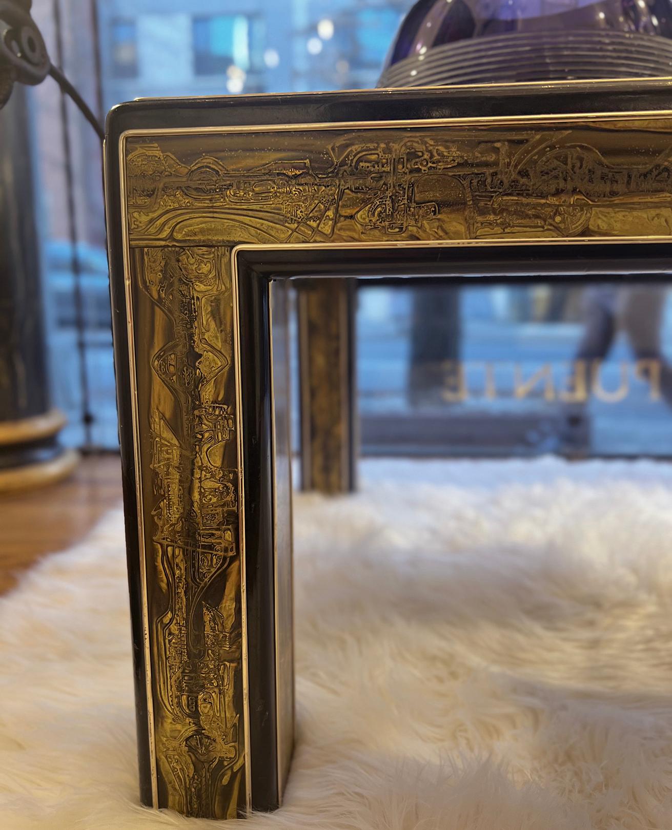 A circa 1960s etched and patinated brass coffee table.

Measurements:
height: 17.5