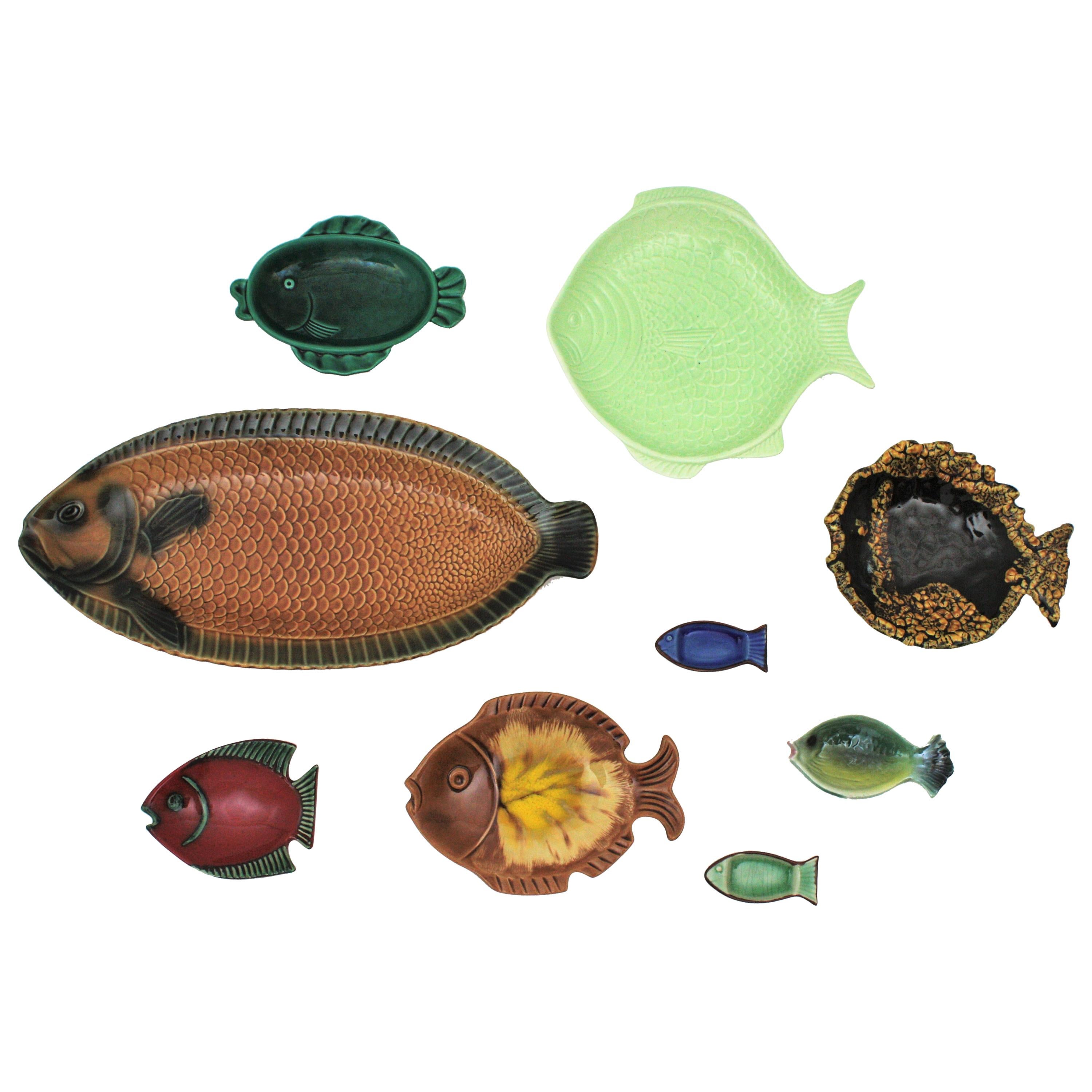 Mid-Century Modern European Majolica glazed ceramic fishes wall decoration. 1950s-1960s
The set is comprised by 9 pieces: fish platters, plates and fish wall sculptures from Italy, France, Spain, Austria and Portugal. The set is colorful with