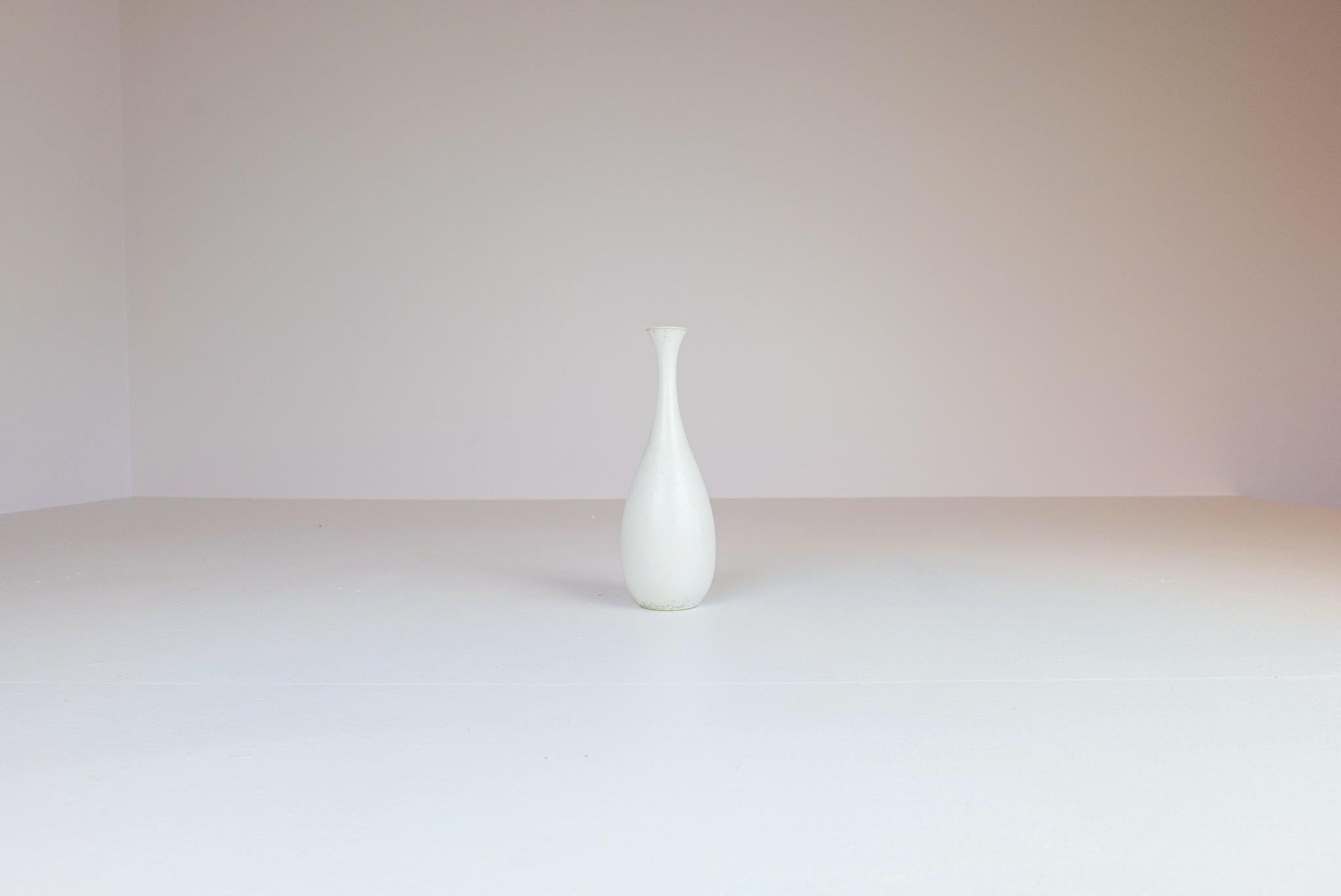 This exceptional vase from Rörstrand and maker/designer Carl Harry Stålhane. Made in Sweden in the midcentury. Its beautiful eggshell glazed combined with its incredible forms makes this an exceptional good piece. 

Very good vintage