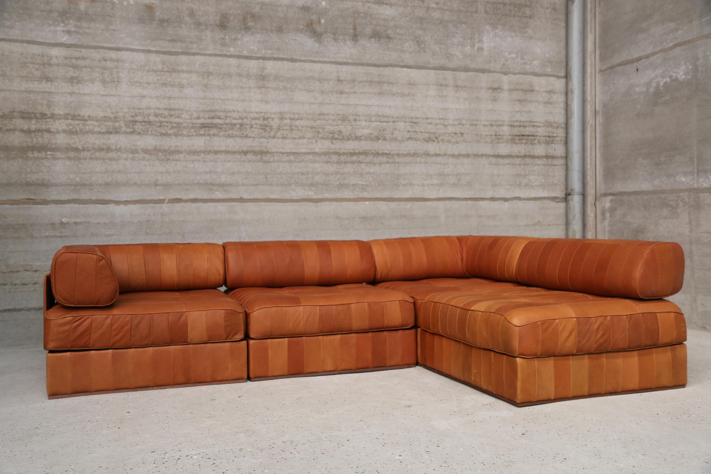 Iconic DS88 modular patchwork sofa restored in our signature vintage aniline leather. New quality foam and new leather. You can play with the modular composition of the sofa. This set consists of 4 modules, 2 normal modules and 2 corner L