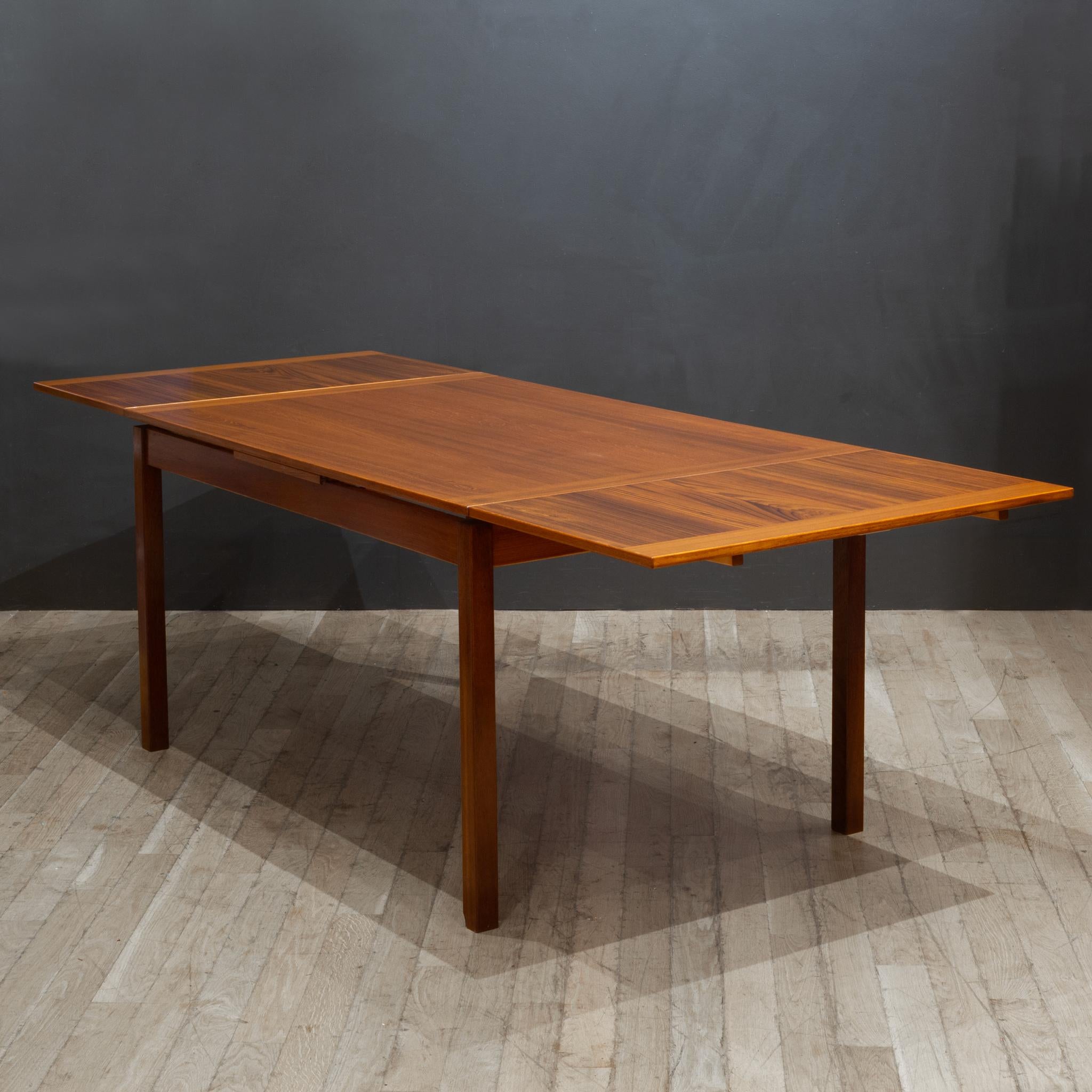 ABOUT

An original Danish Teak dining table with expandable draw leaves. Seats six when closed and up to ten when expanded. Original stamp underneath.

    CREATOR Attributed to Ansagar Mobler, Denmark.
    DATE OF MANUFACTURE c.1960-1970.
   
